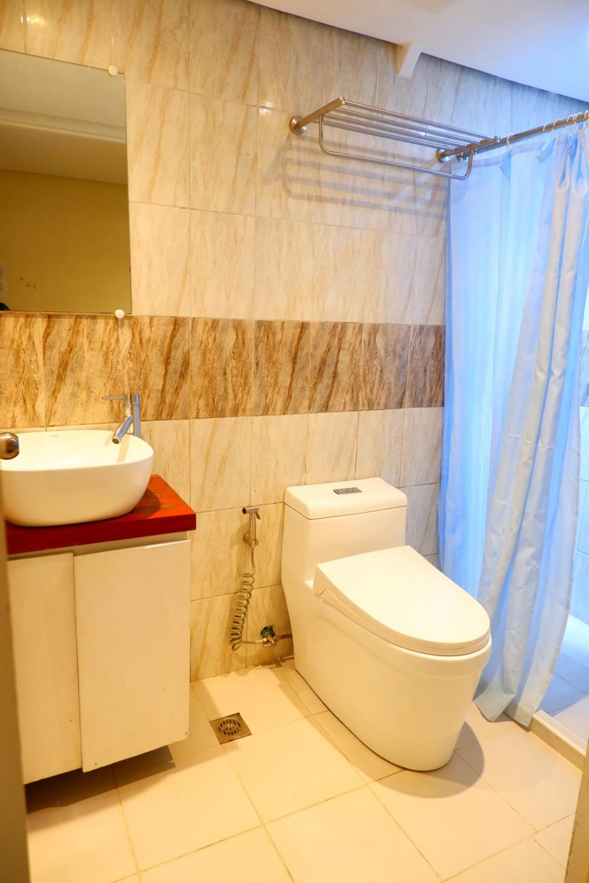 Toilet in Sunset View Ridge Residences