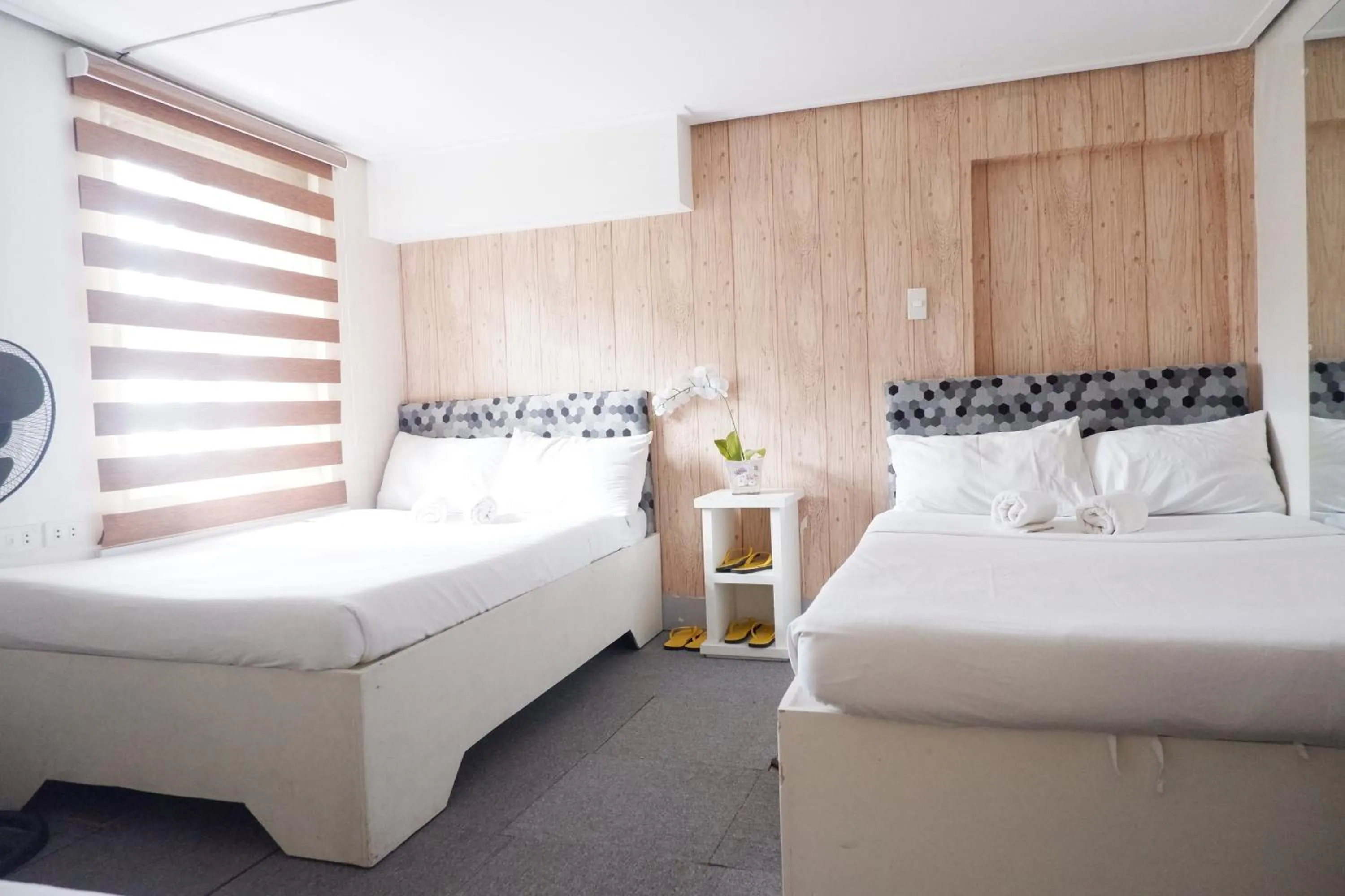 Bed in Sunset View Ridge Residences