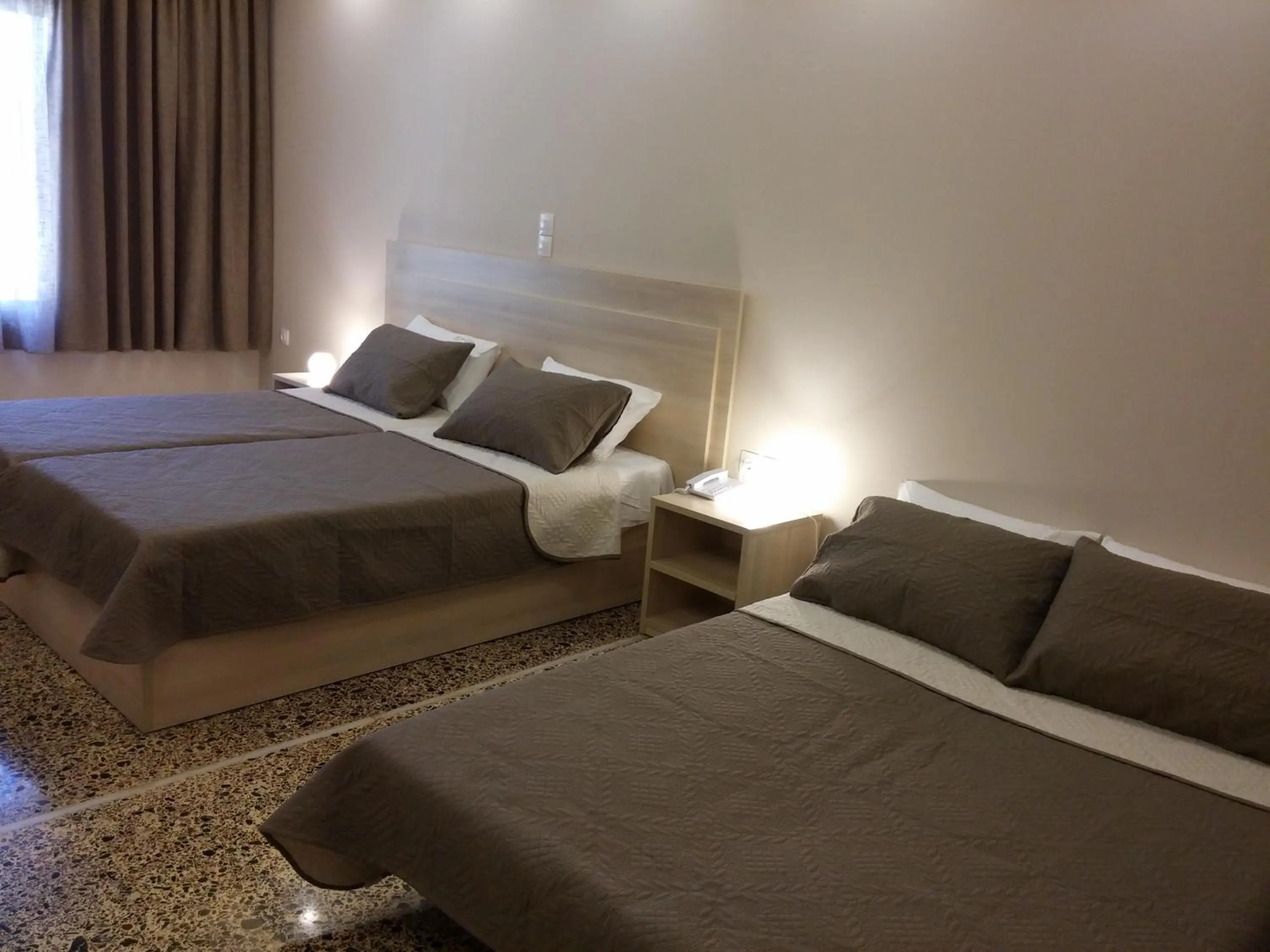 Bed in Anetis Beach Hotel