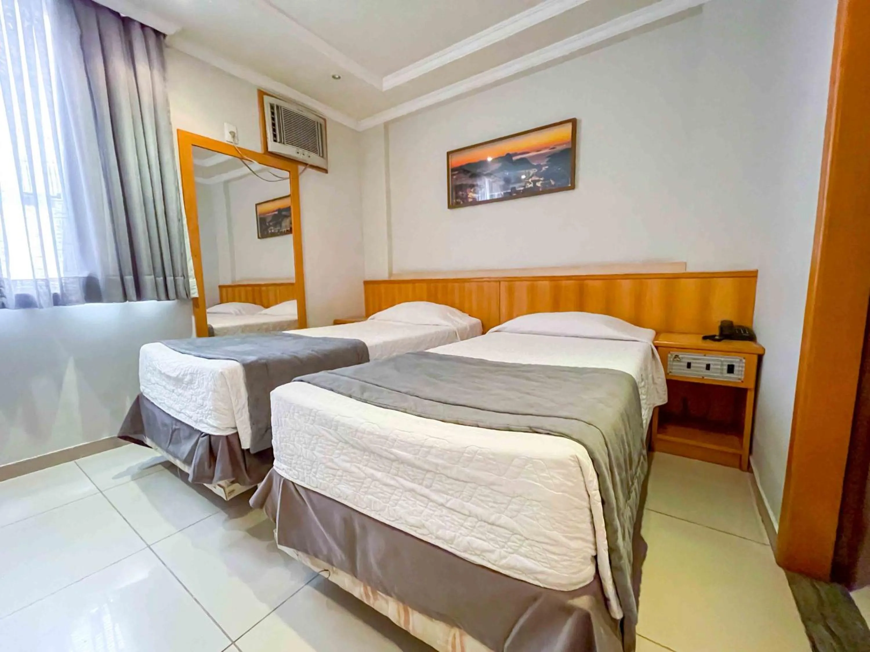 Bed in Saionara Hotel