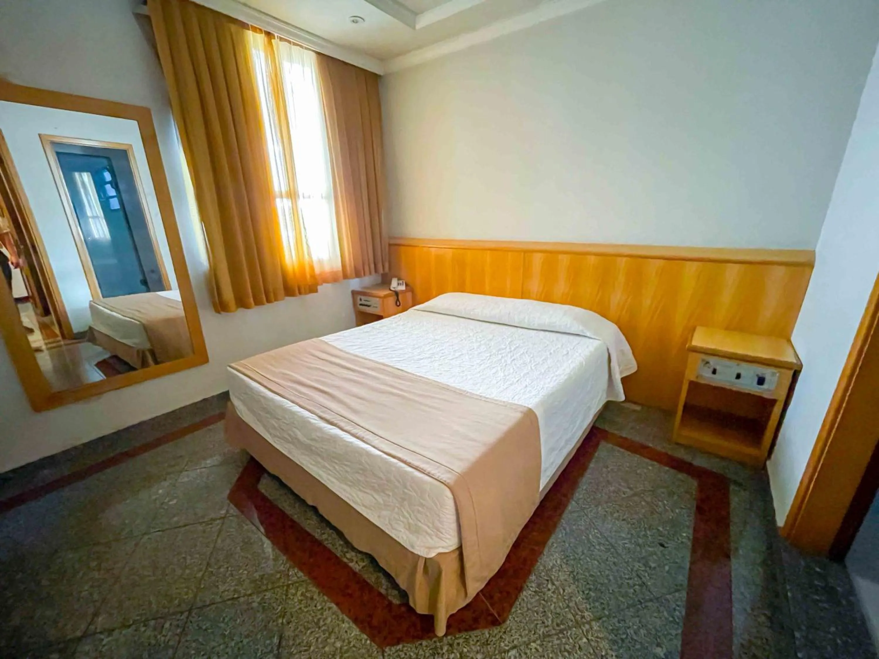 Bed in Saionara Hotel