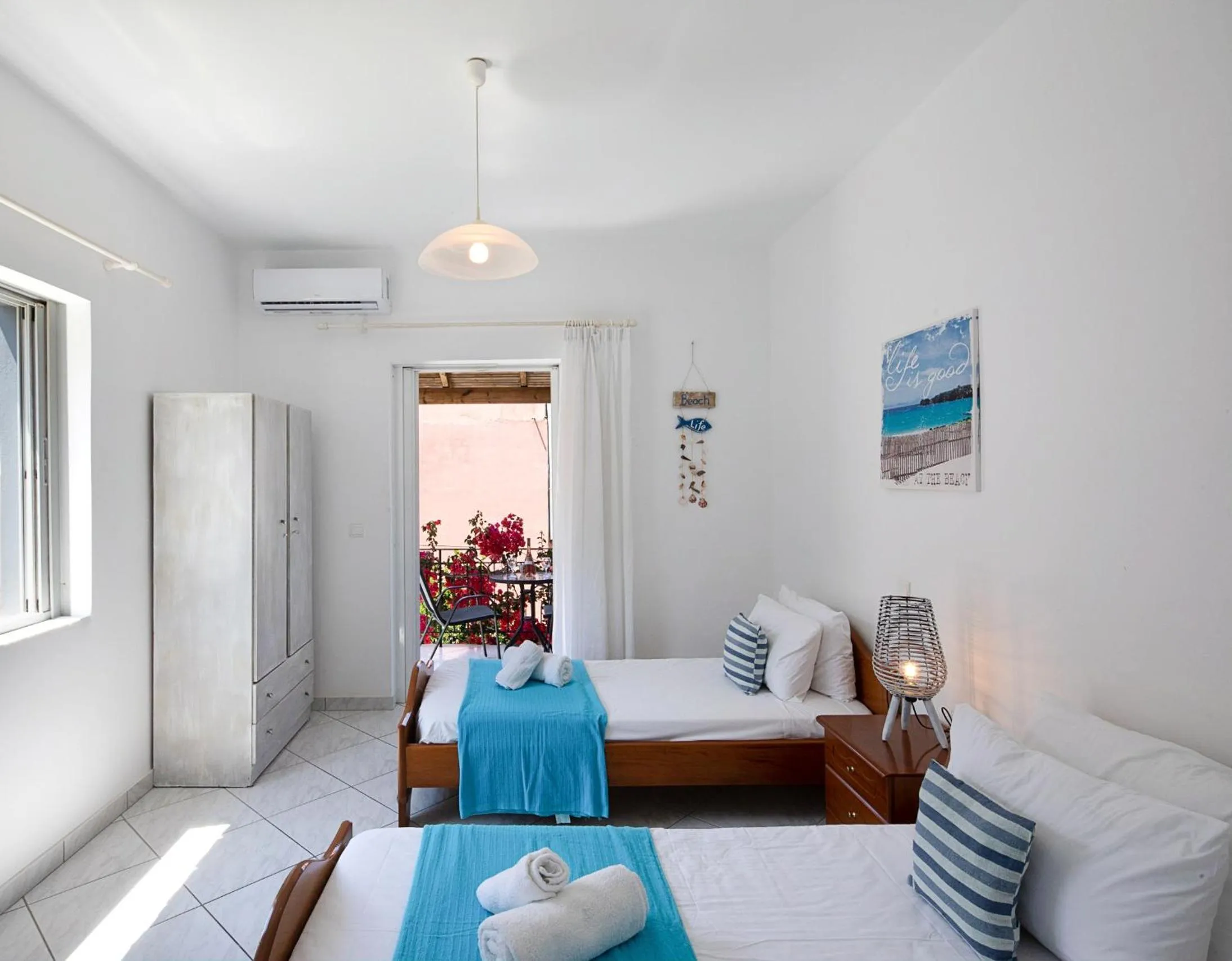 Bed in Irini Apartments and Studios