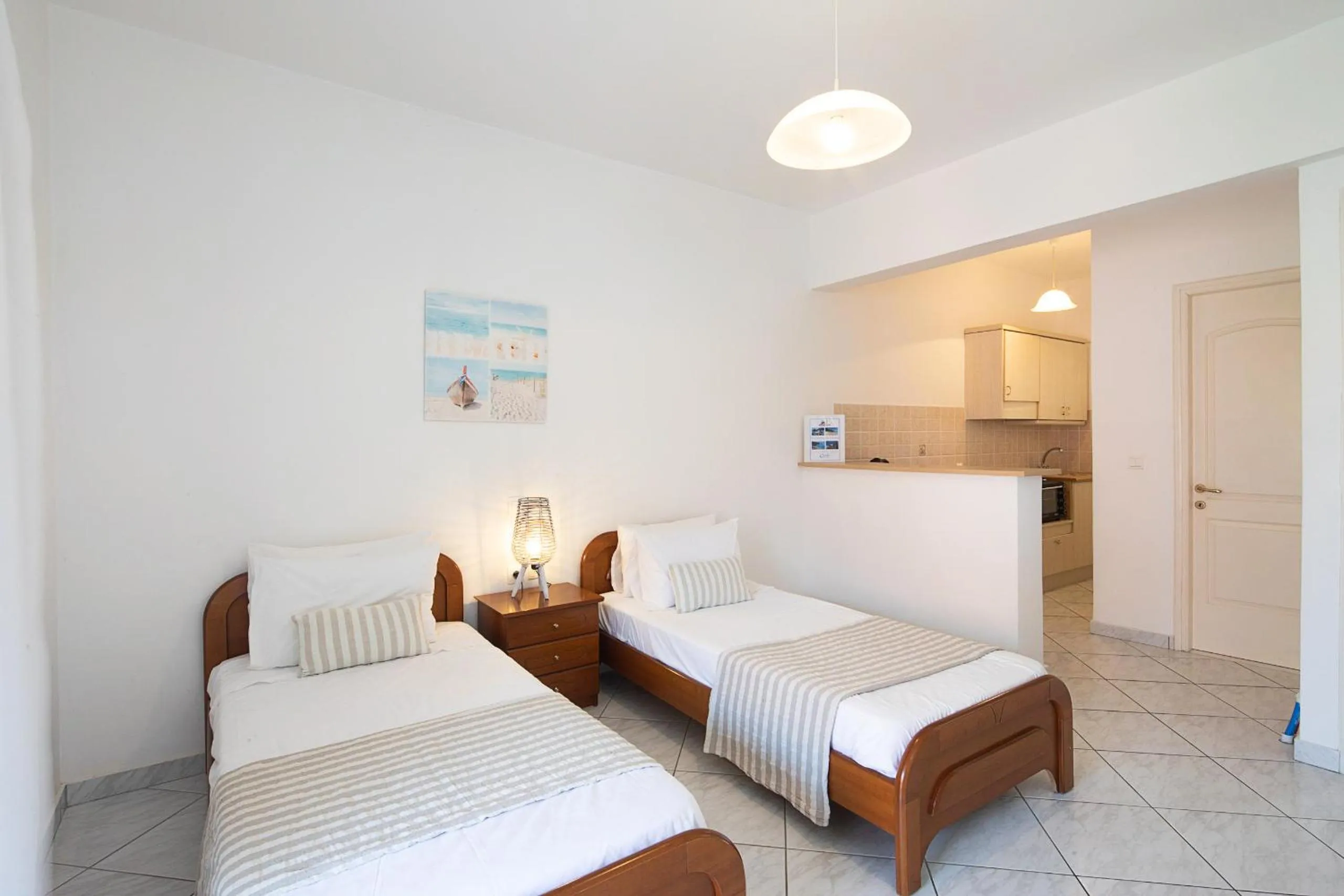 Bed in Irini Apartments and Studios