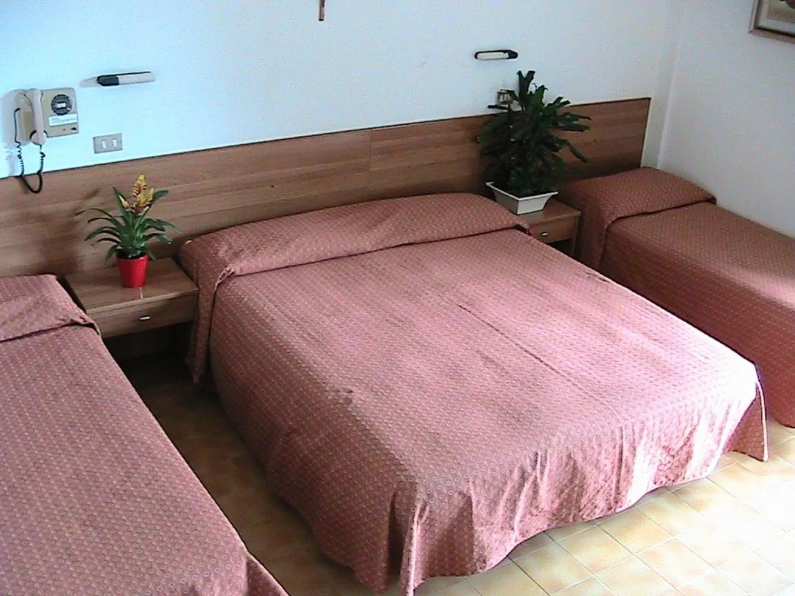 Bed in Hotel Universo