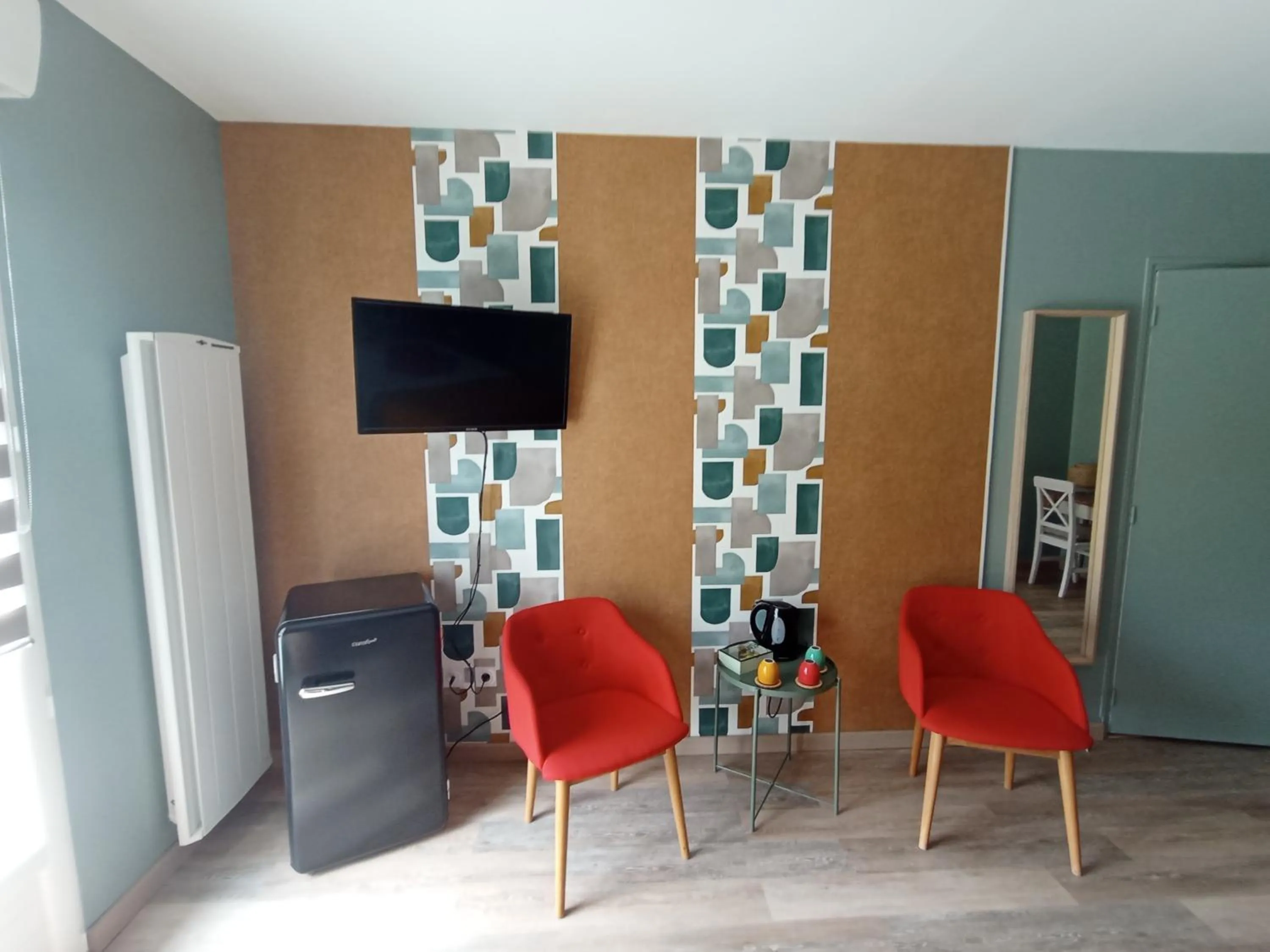 Seating area in Chambres et Tables d'hotes " O Doux Matins " aux portes de Chinon