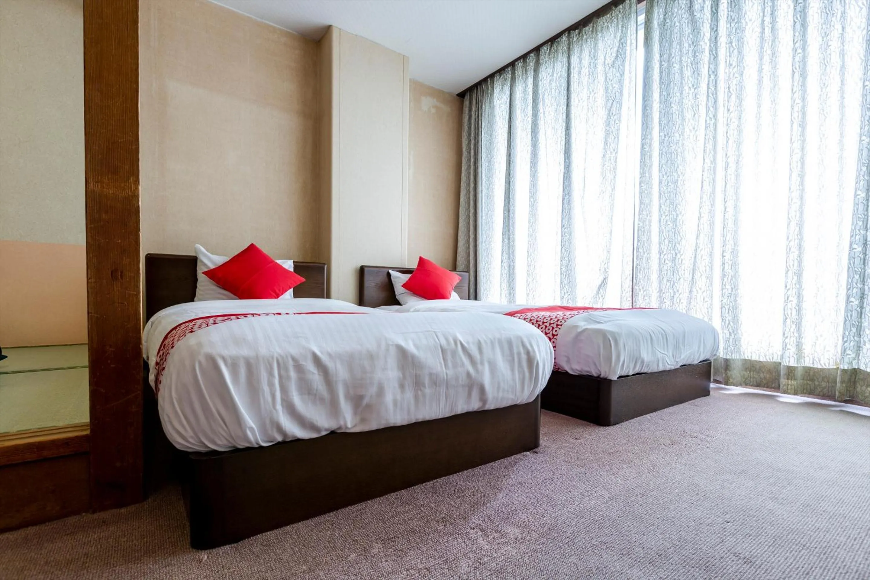 Bedroom, Bed in Tsuruga Tunnel Onsen Kitaguni Grand Hotel