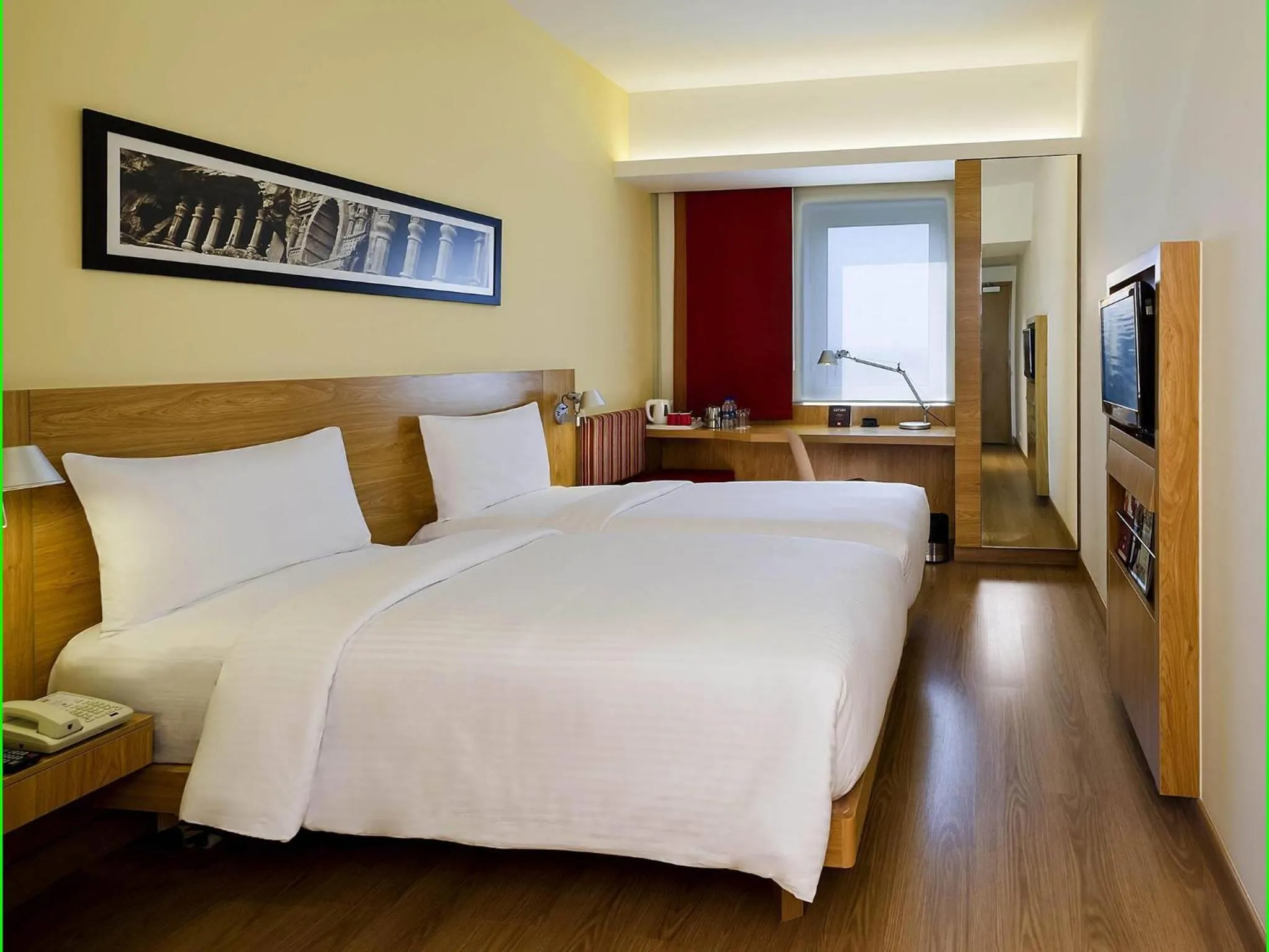 Bedroom, Bed in ibis Nashik - An Accor Brand