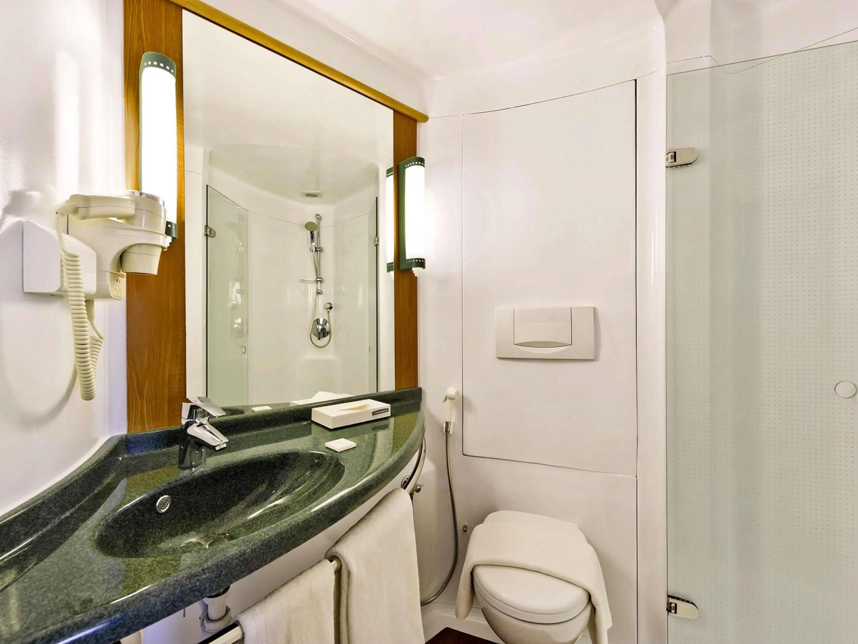 Bedroom in ibis Nashik - An Accor Brand