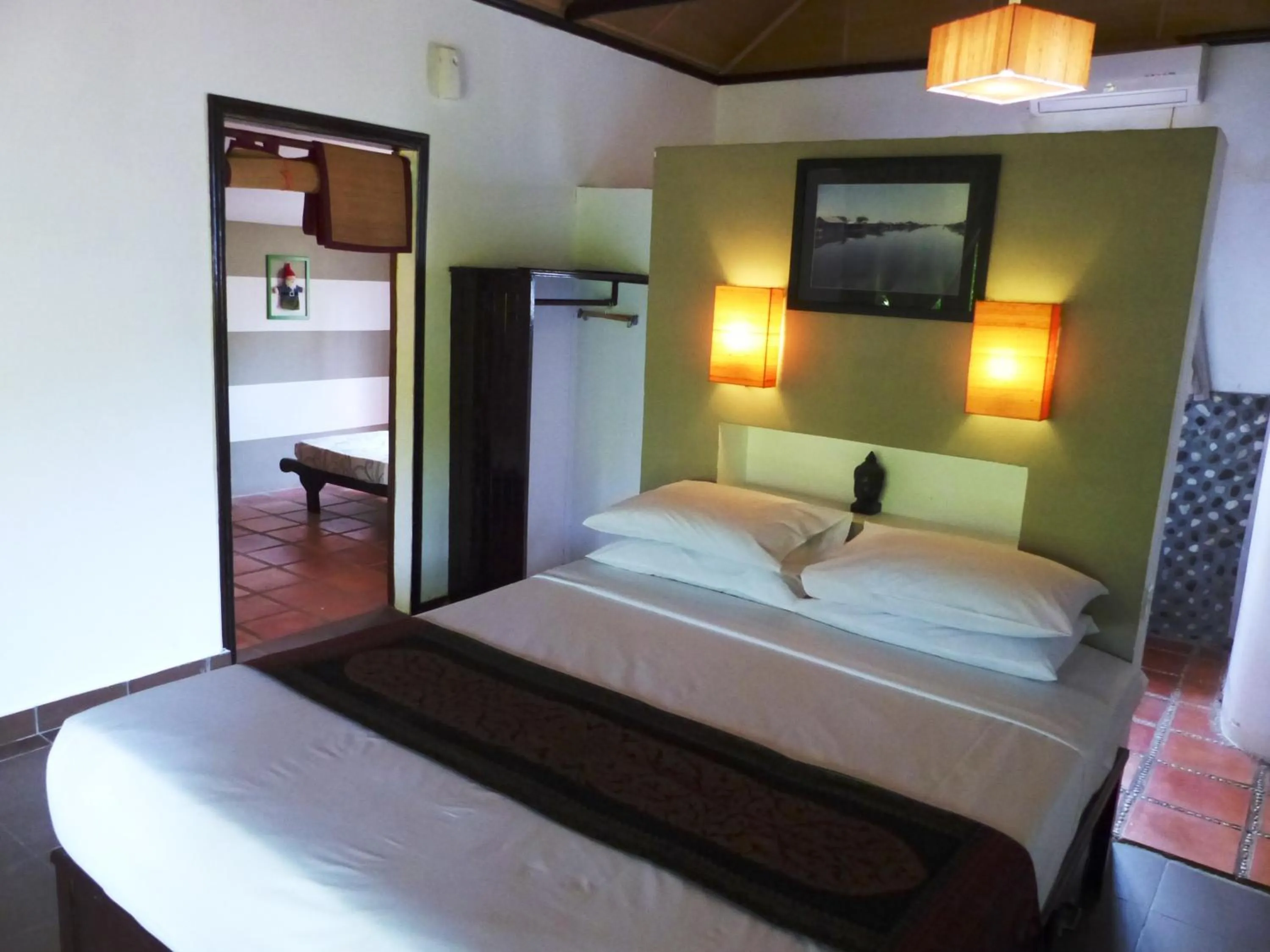 Photo of the whole room, Bed in Raingsey Bungalow