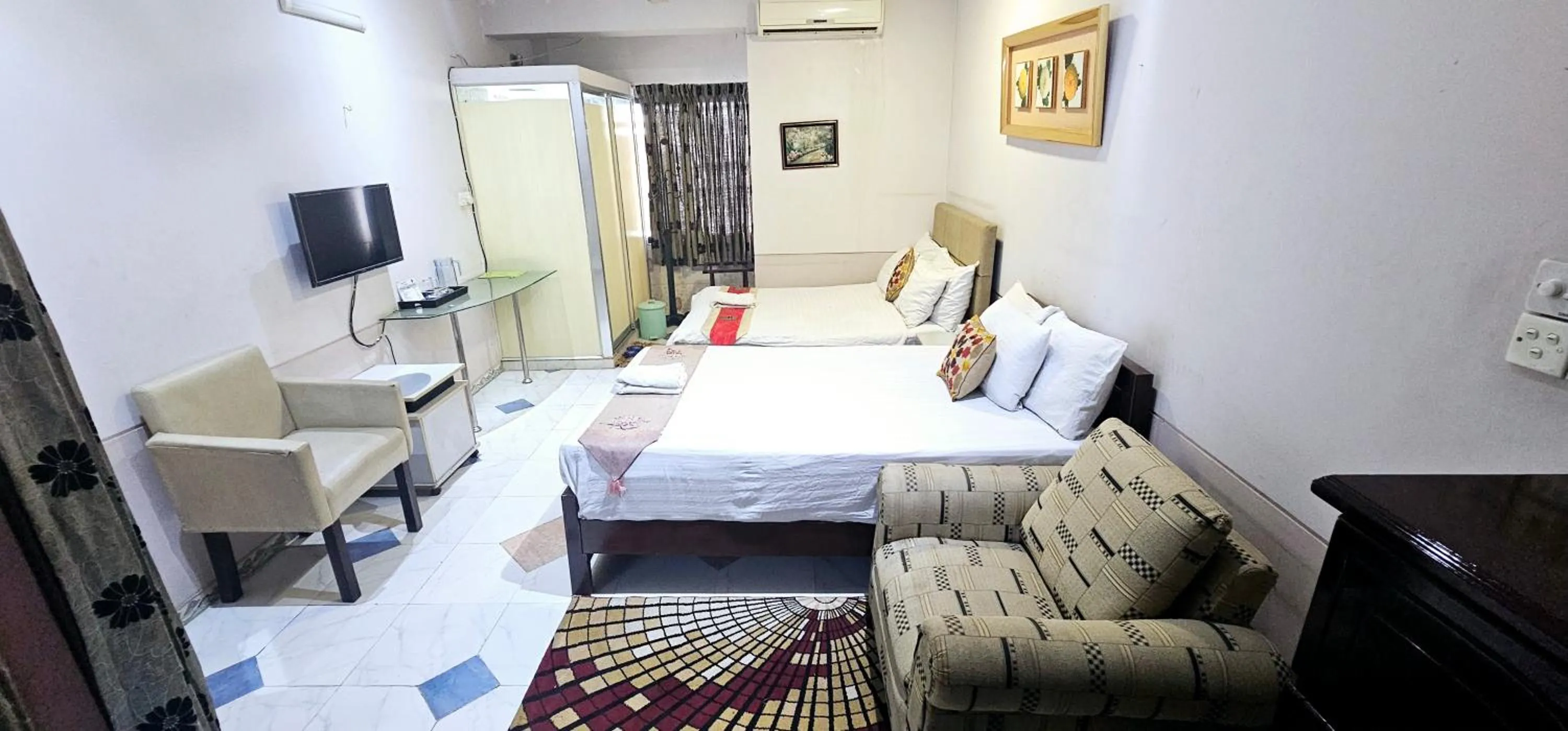 Bed in Babylon Hotel & Serviced Apartment