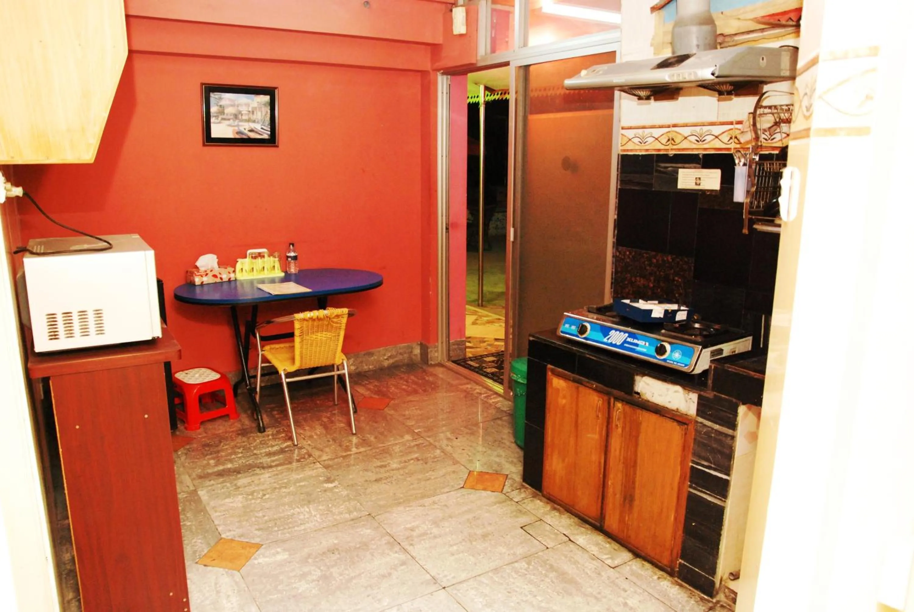 Kitchen or kitchenette in Babylon Hotel & Serviced Apartment