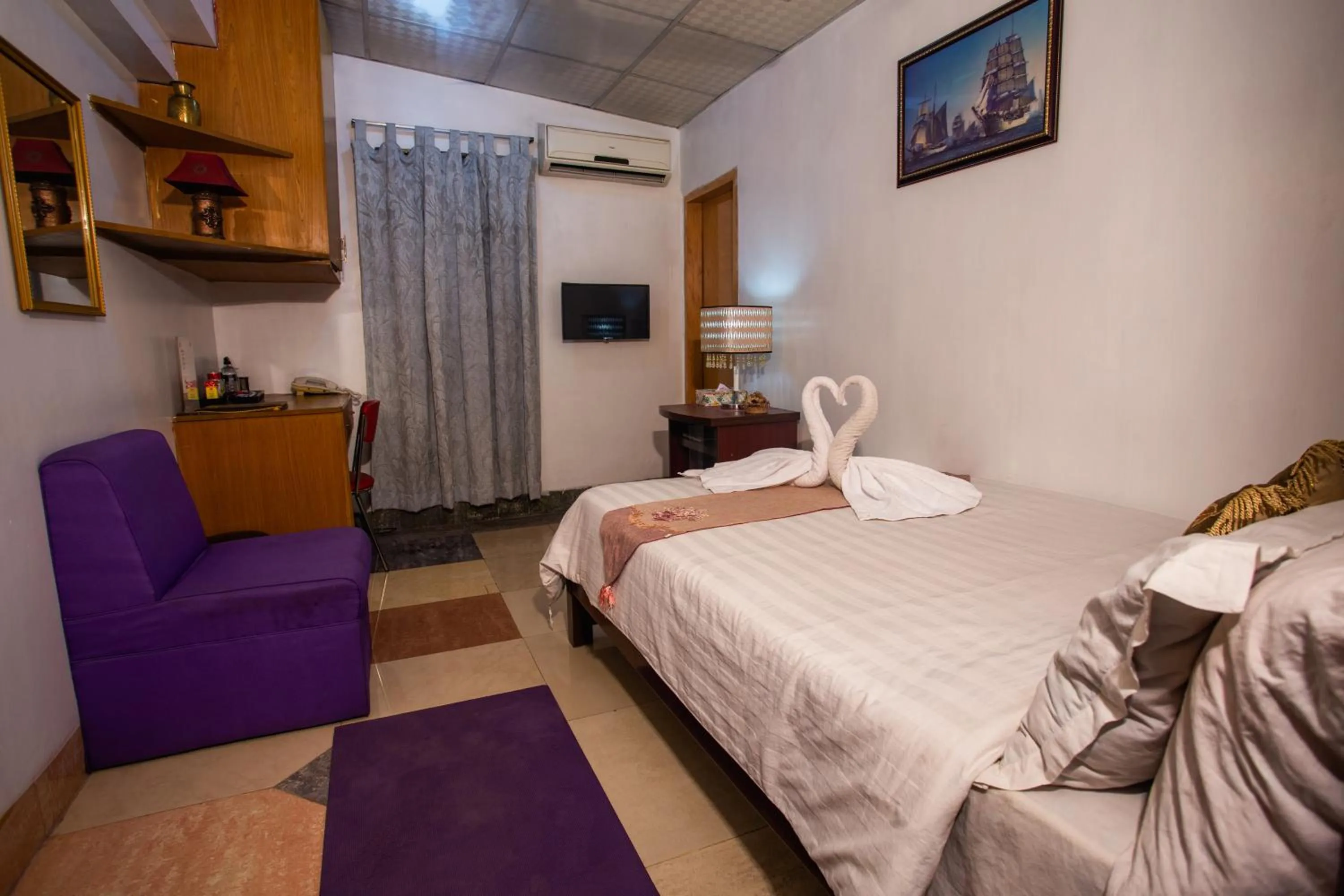 TV and multimedia, Bed in Babylon Hotel & Serviced Apartment
