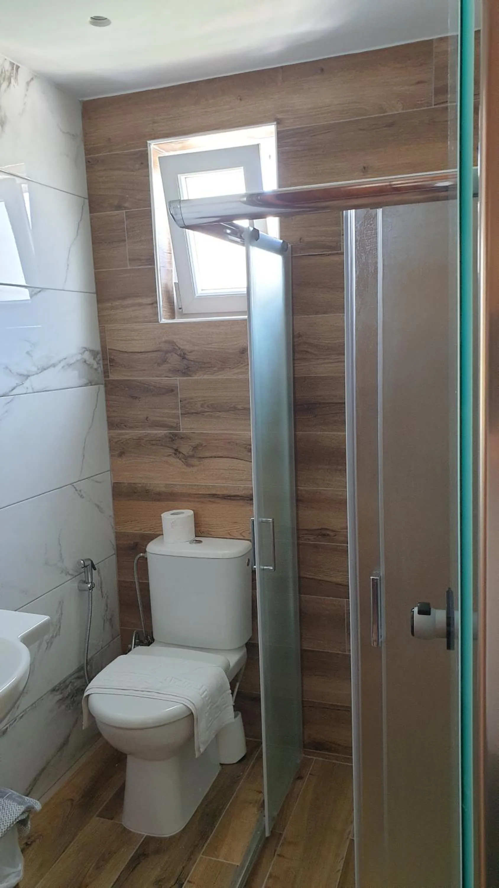 Bathroom in Miros Hotel Apartments