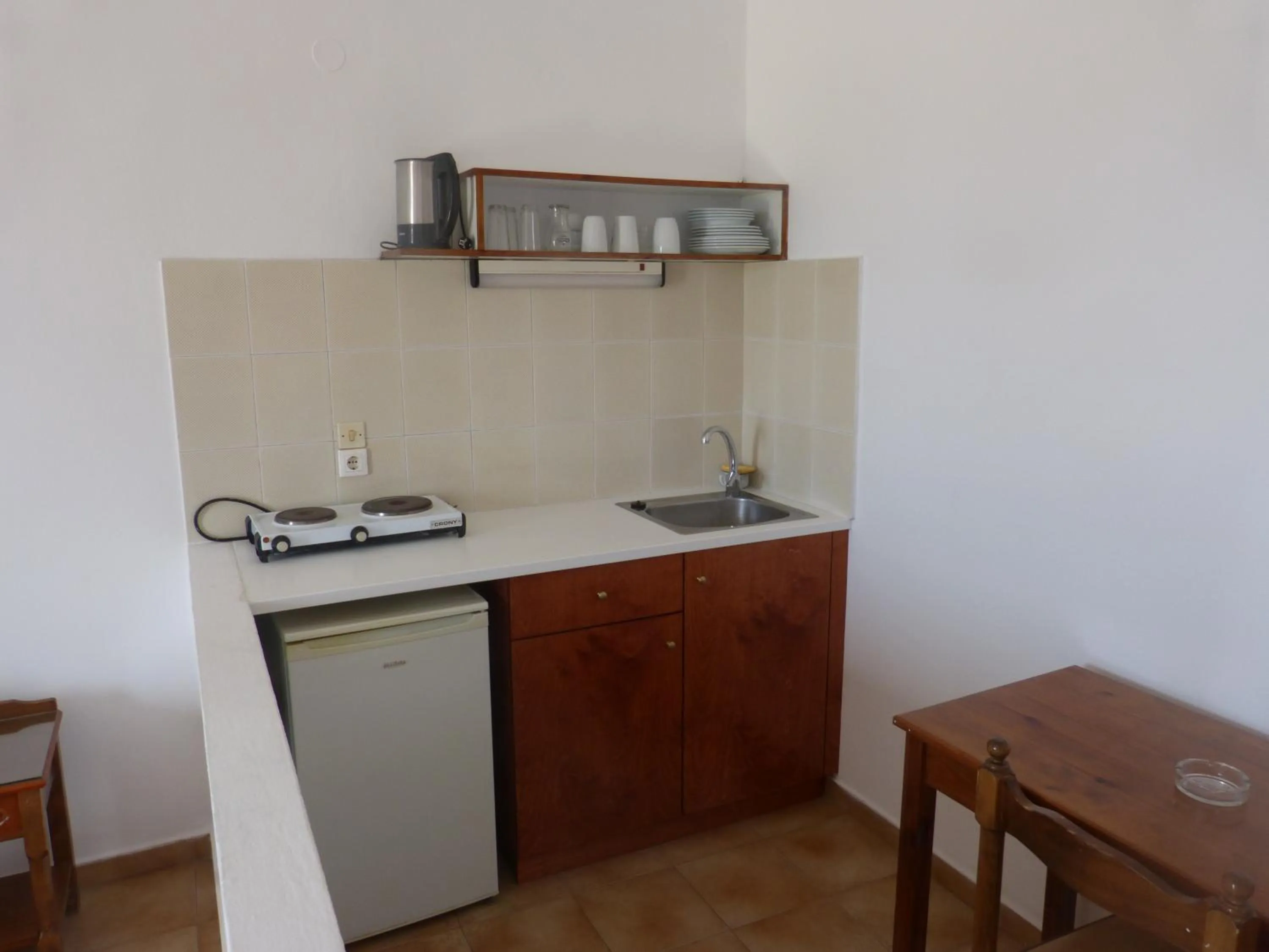 Kitchen or kitchenette in Miros Hotel Apartments