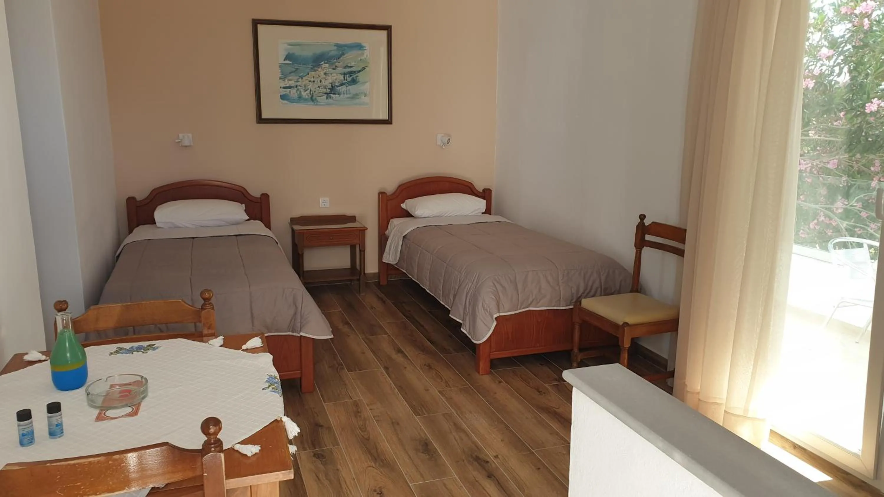 Bed in Miros Hotel Apartments
