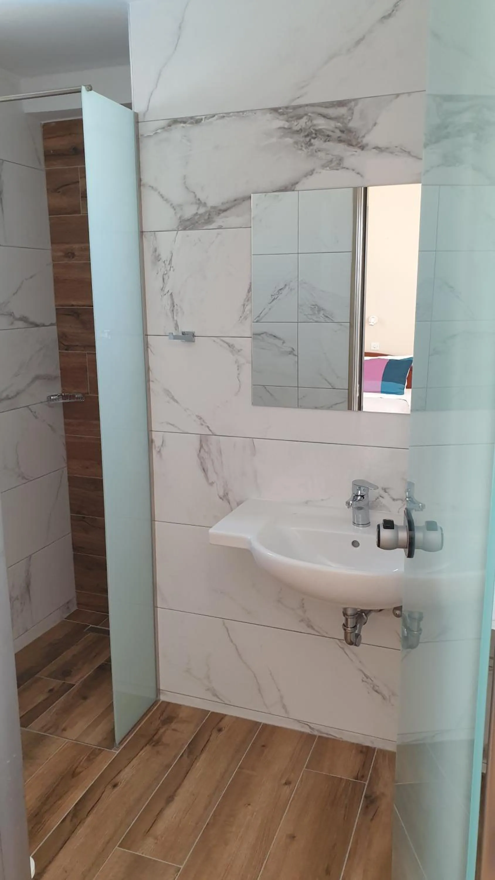 Bathroom in Miros Hotel Apartments