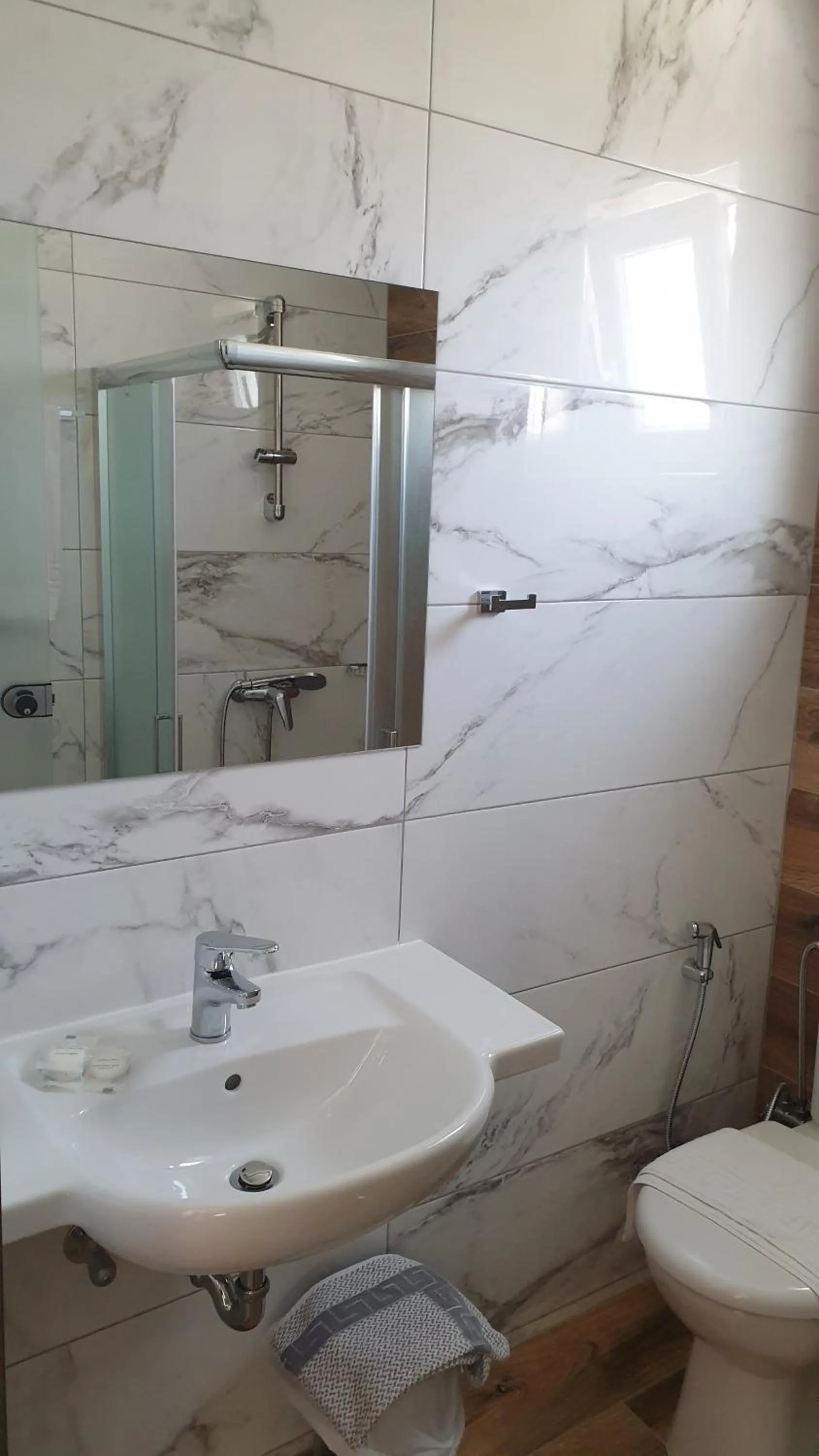 Bathroom in Miros Hotel Apartments