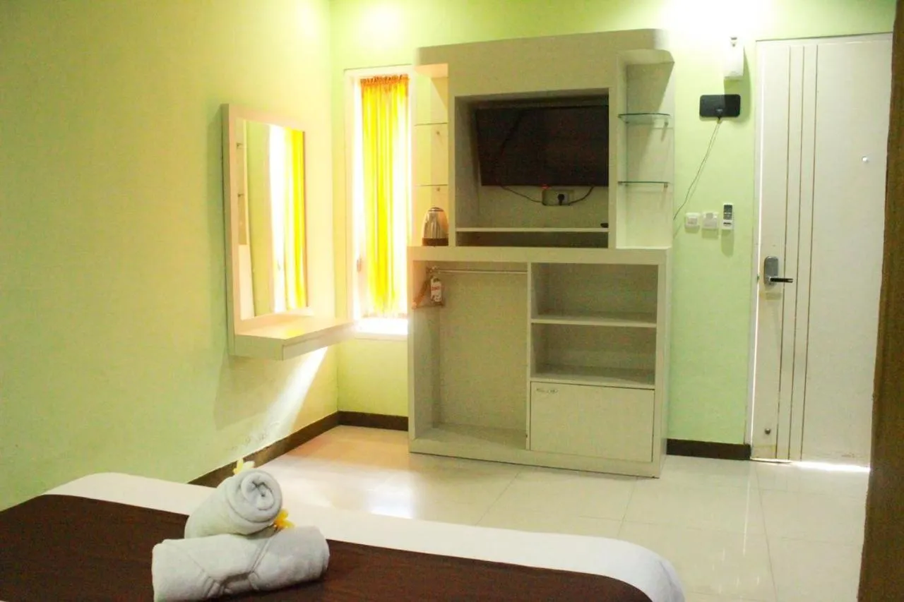 Bed in Dedy Beach Inn