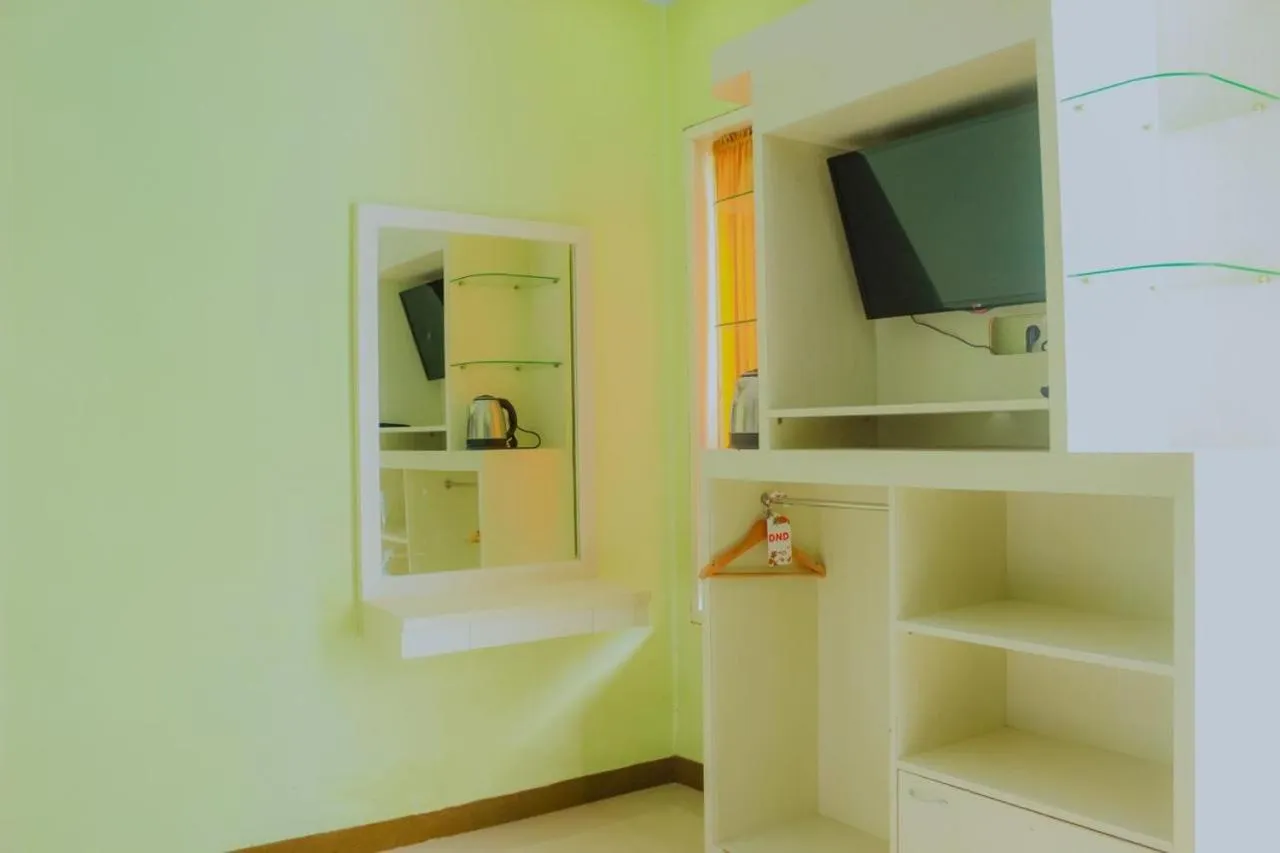 Bedroom in Dedy Beach Inn