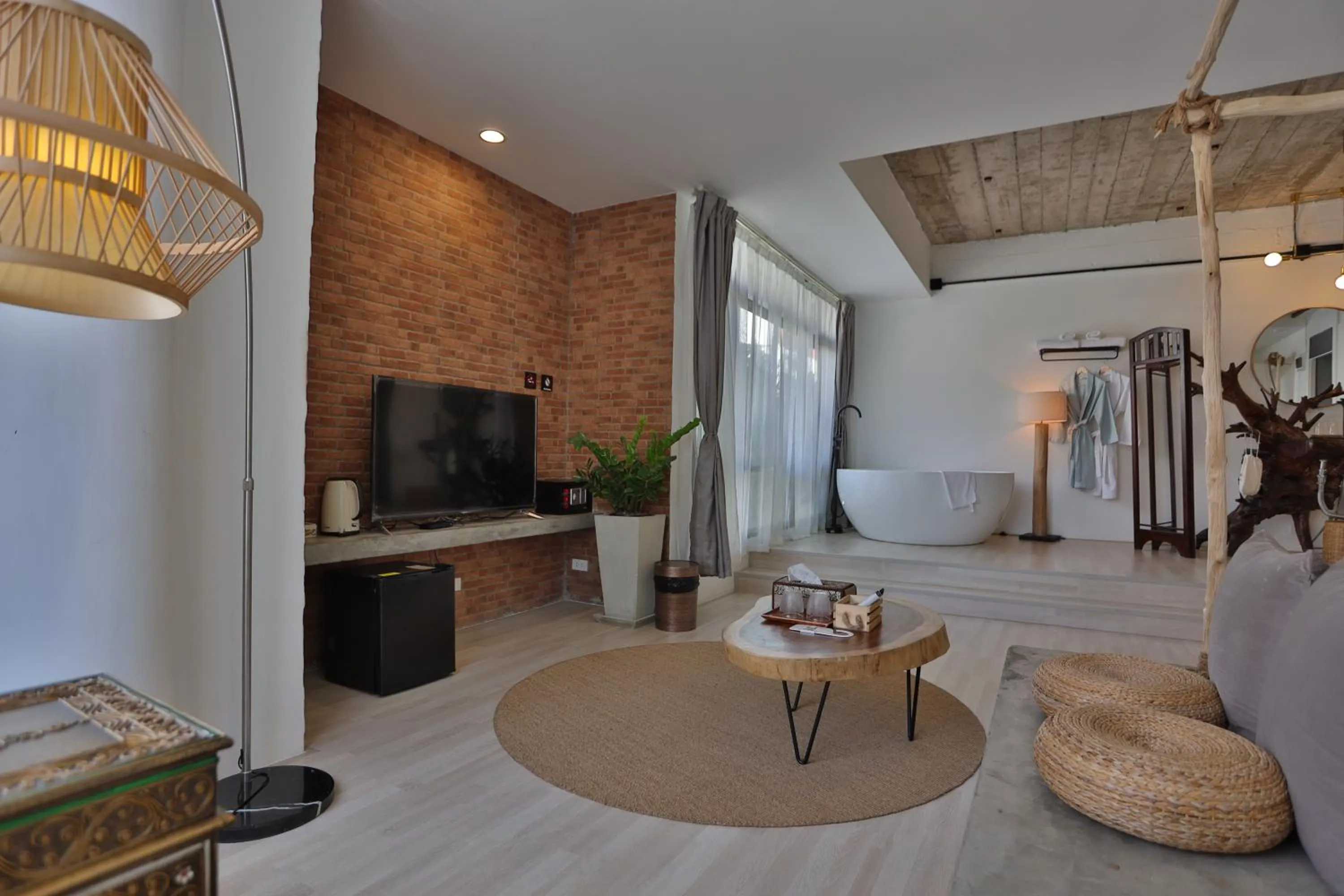 Communal lounge/ TV room in YOLO Bangkok Boutique Hotel