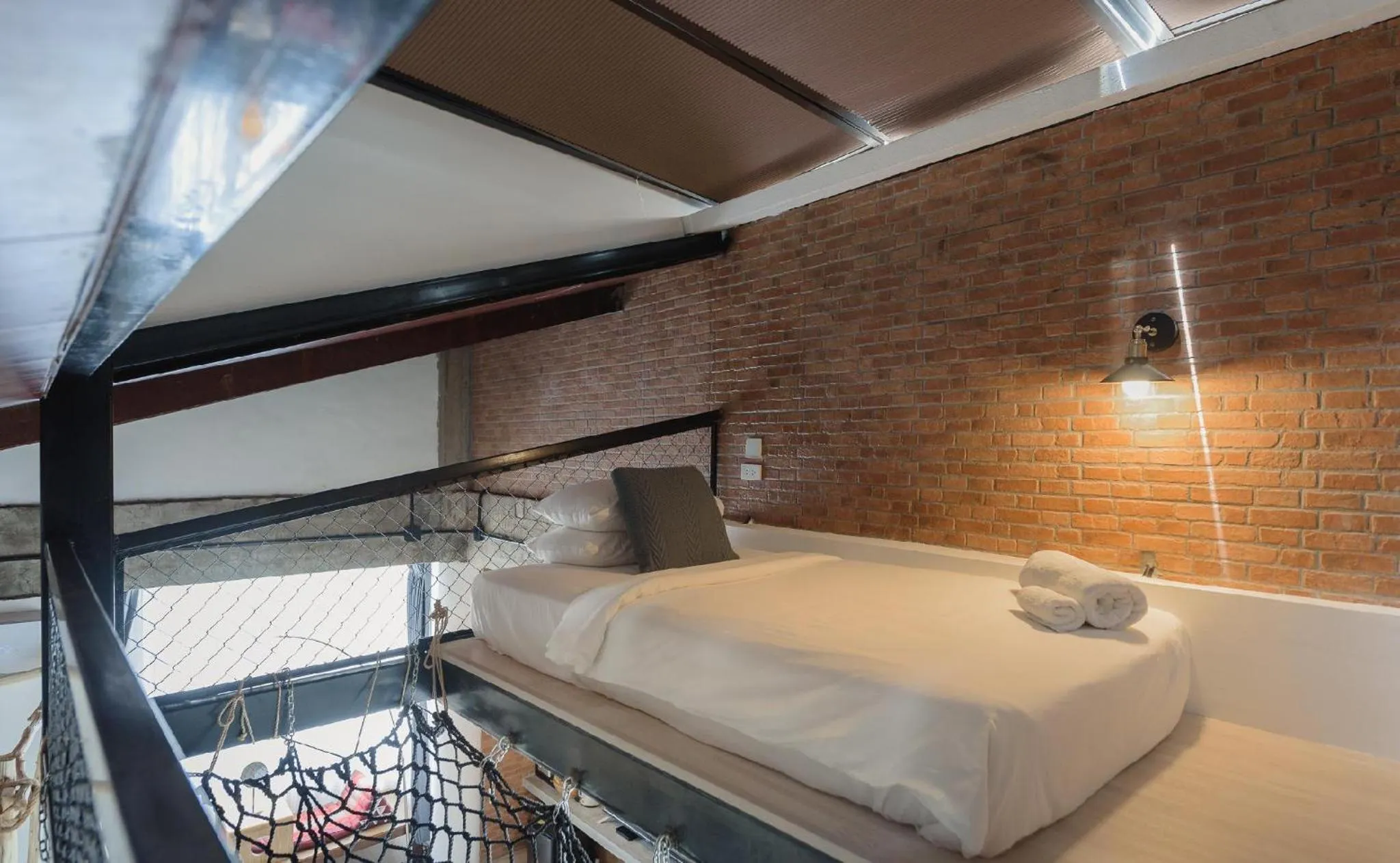 Bed in YOLO Bangkok Boutique Hotel