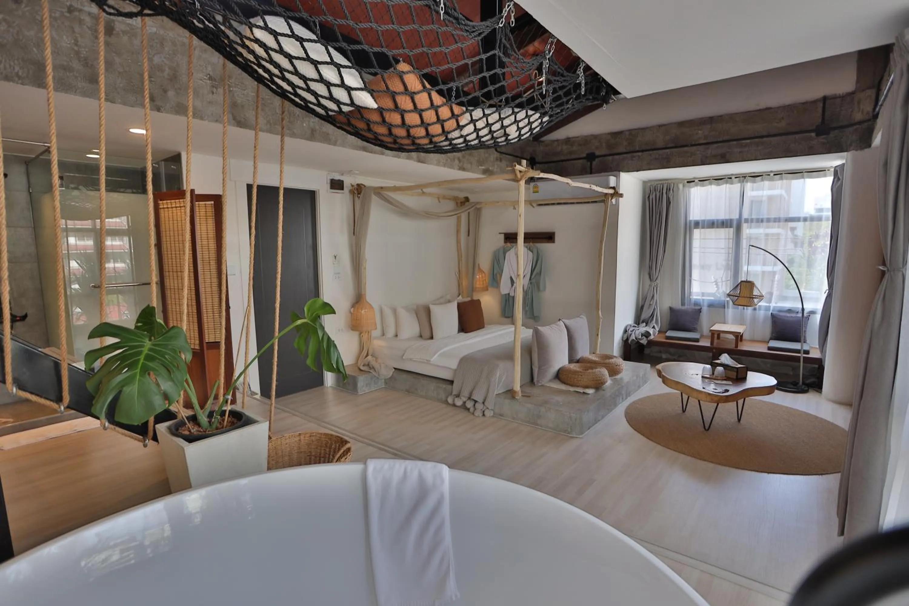 Seating area, Bed in YOLO Bangkok Boutique Hotel