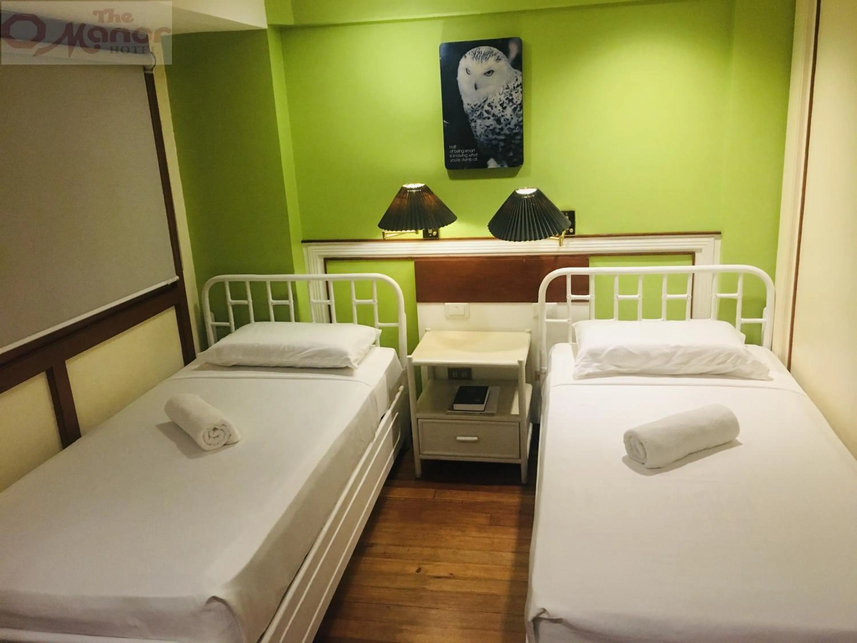 Bed in The Manor Hotel