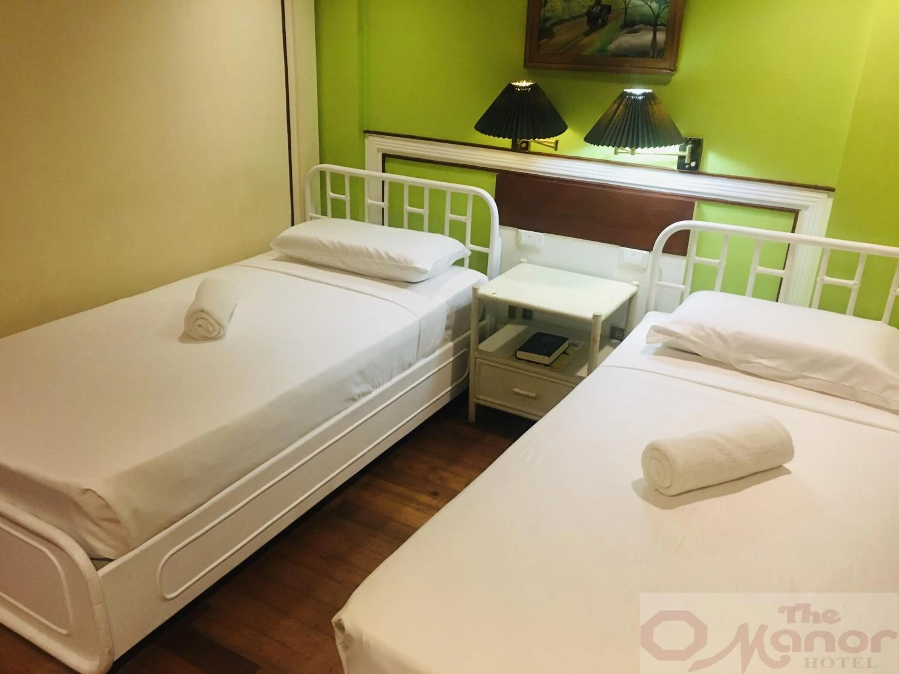 Bed in The Manor Hotel