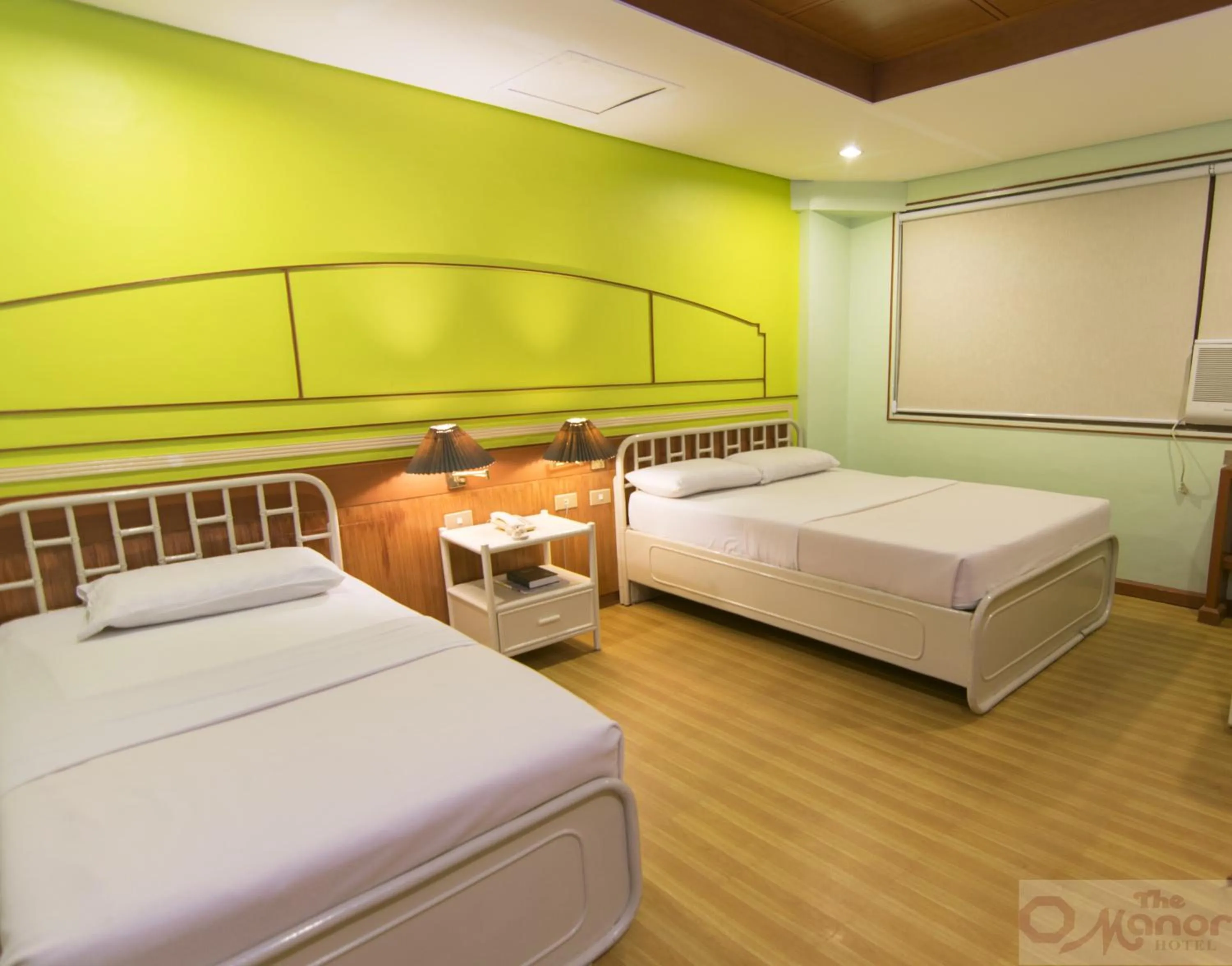 Bed in The Manor Hotel