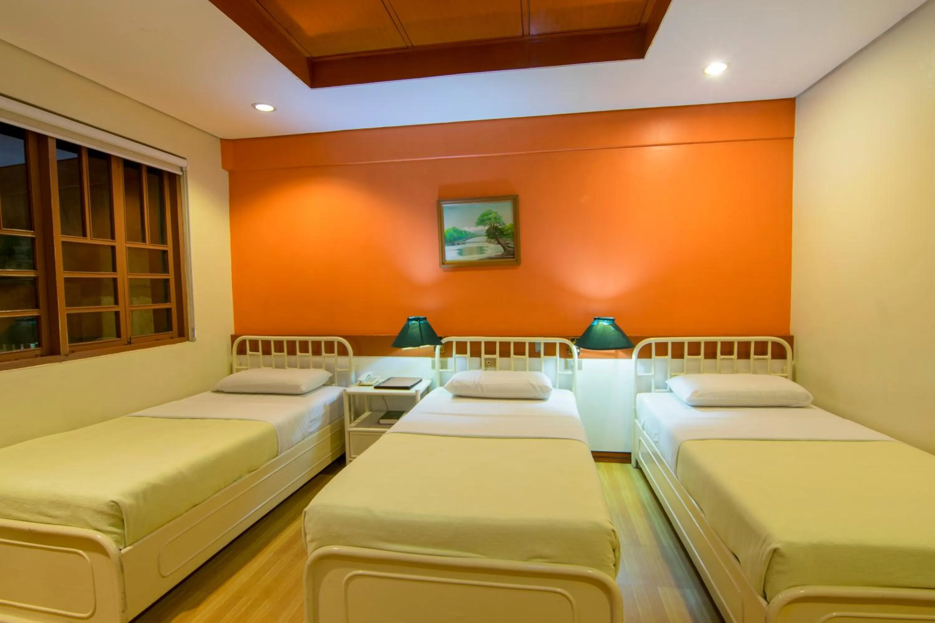 Bed in The Manor Hotel