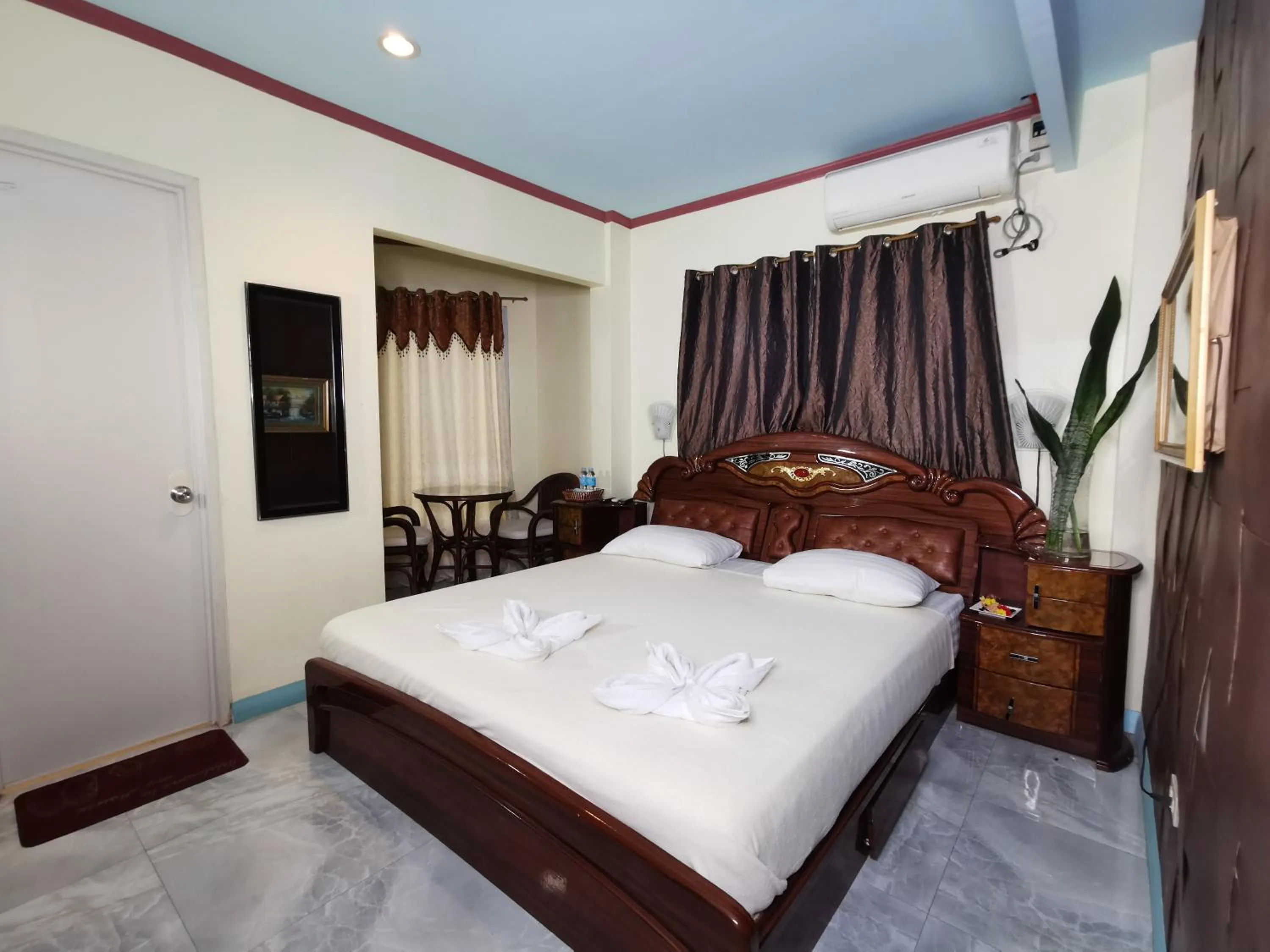 Bed in Cebu Hilltop Hotel