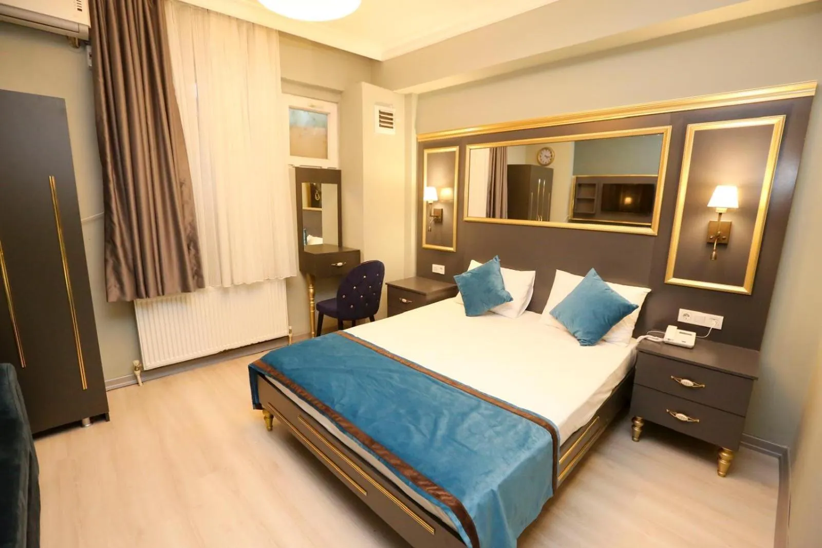 Bed in Grand Moon Hotel Suites