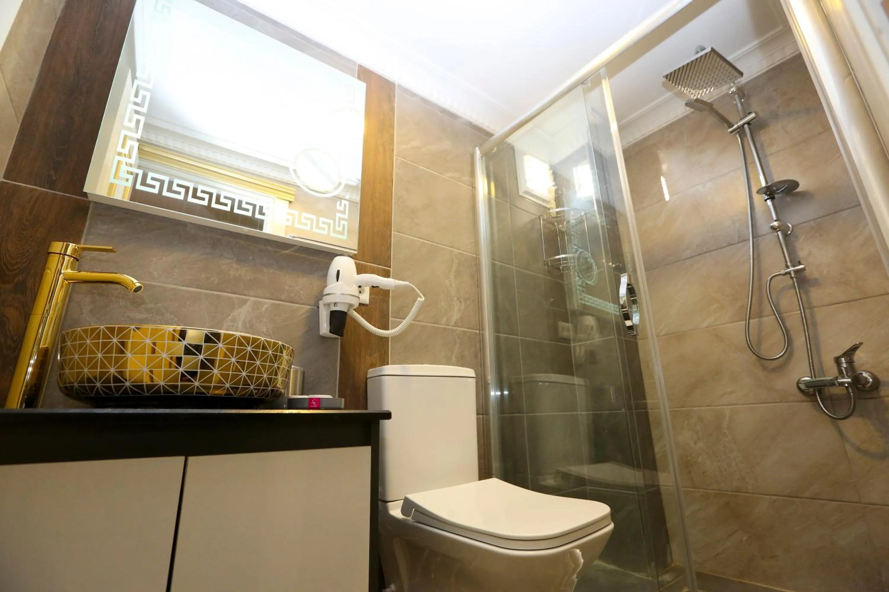 Shower in Grand Moon Hotel Suites