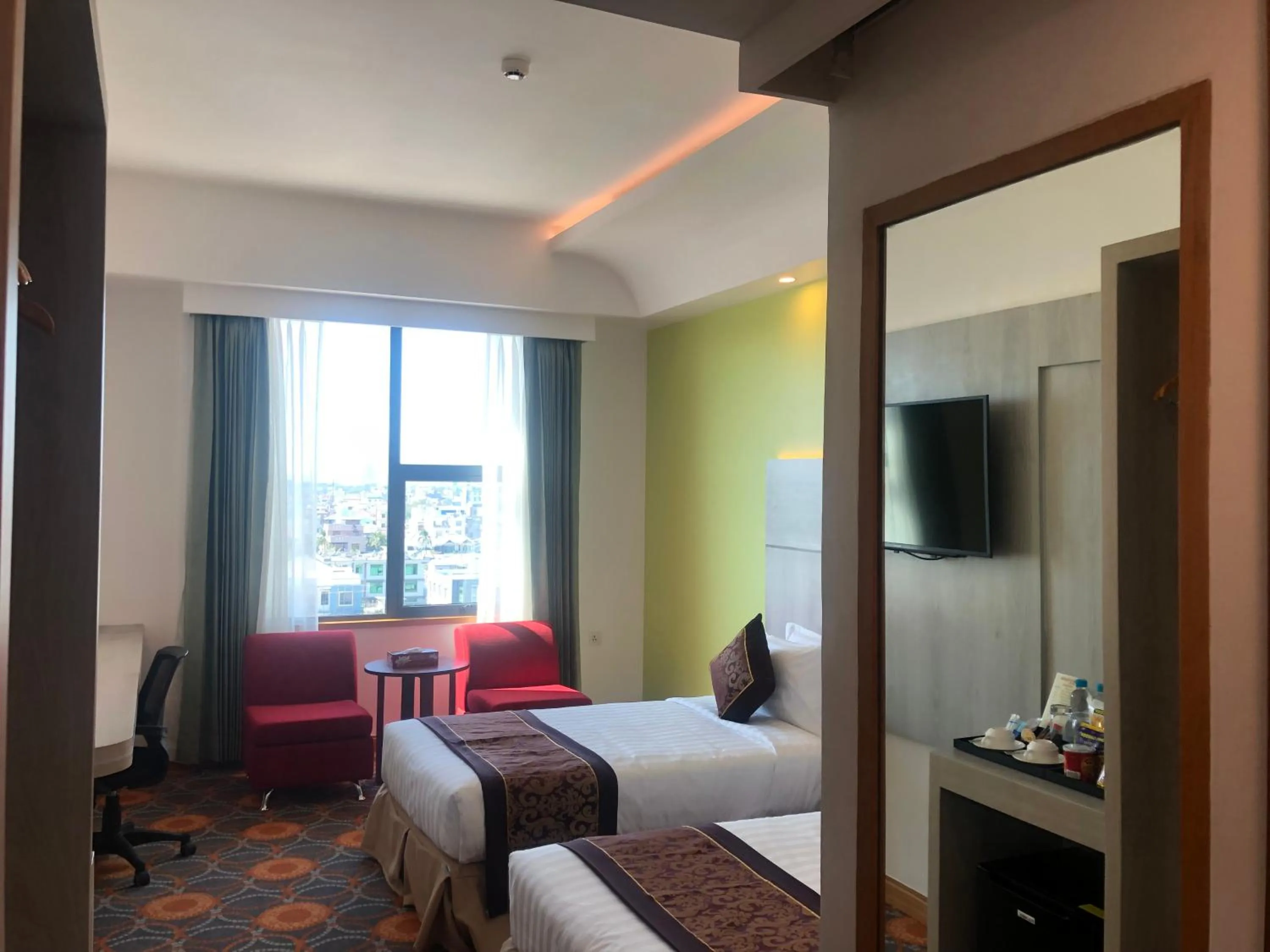 Bed in Ritz Grand Hotel Mandalay