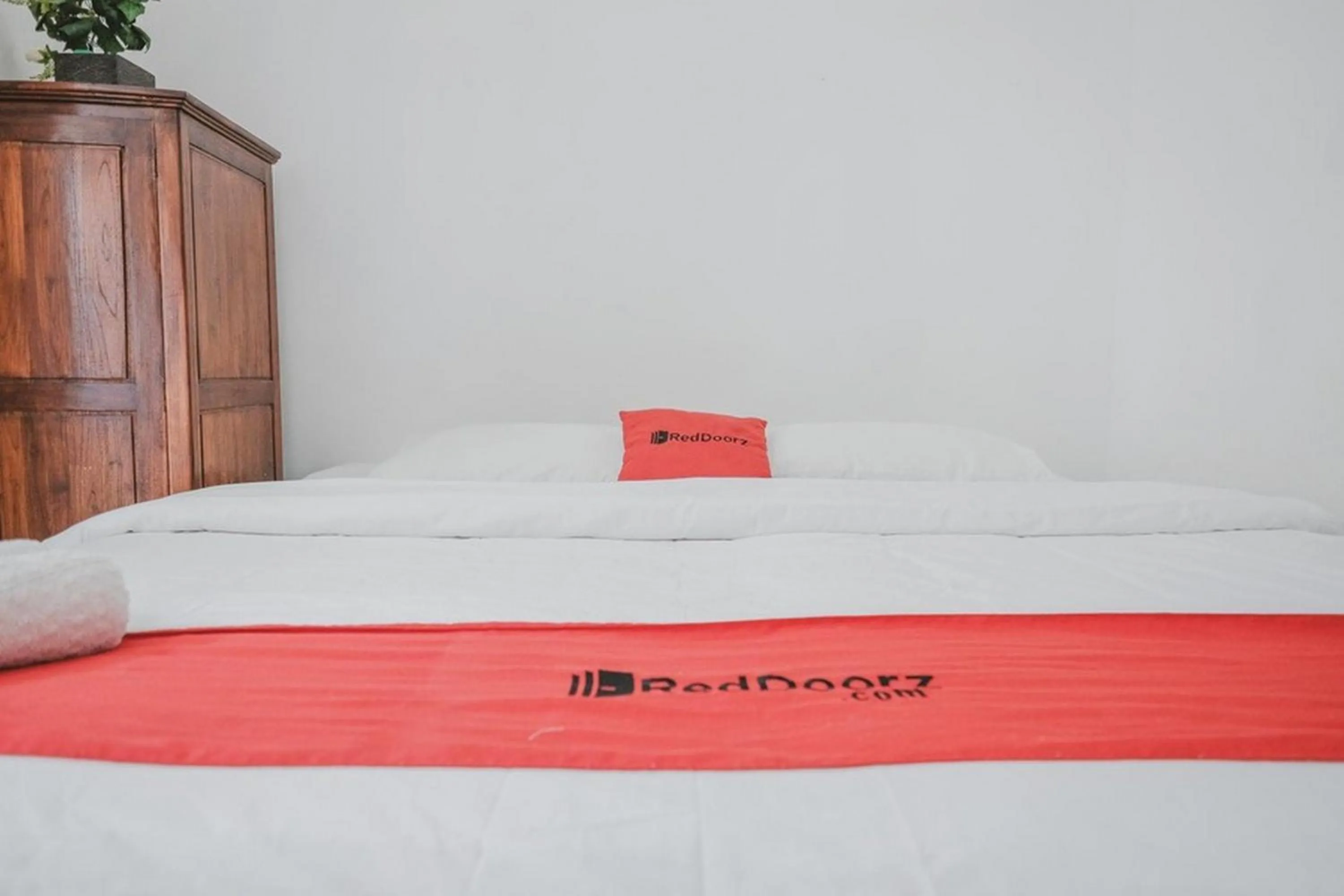 Bedroom, Bed in RedDoorz Syariah At Lampung Walk