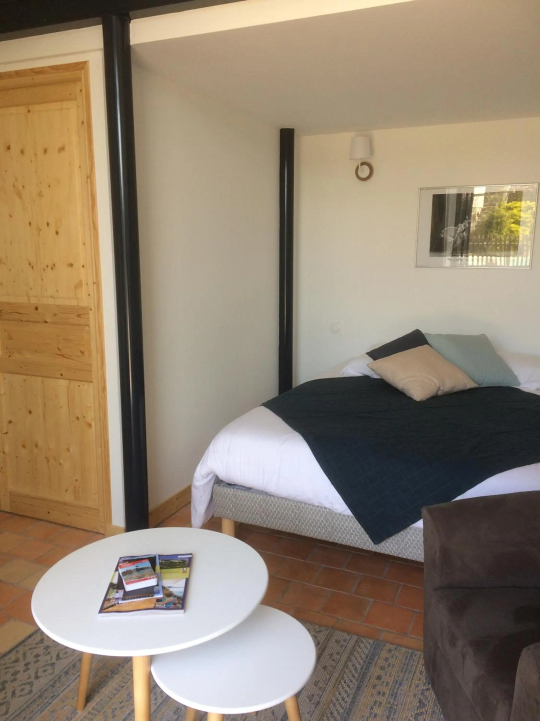 Living room, Bed in Chambre D' Hôtes La Lucasserie