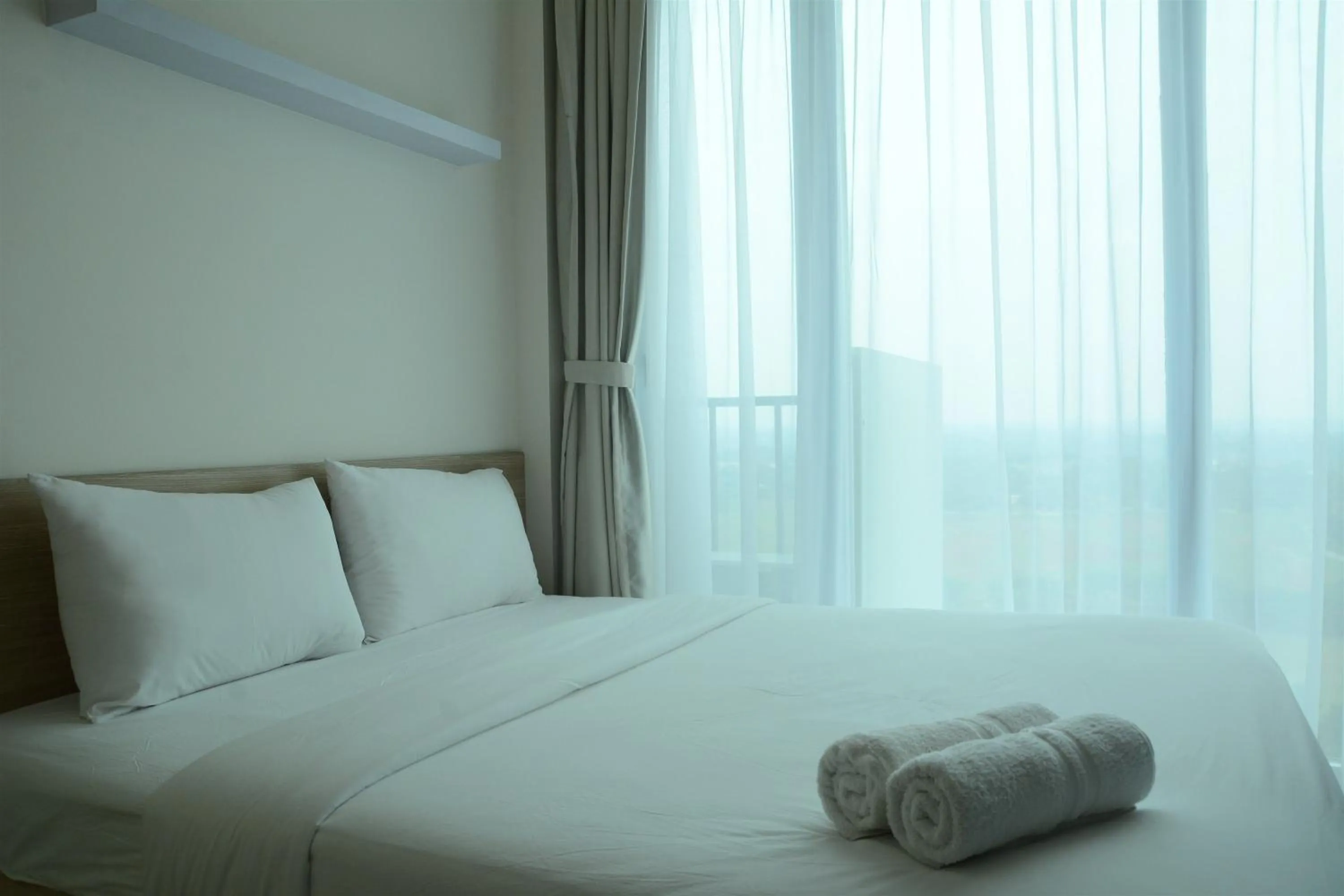Bed in Brand New Studio Tree Park City BSD Apartment near ICE BSD By Travelio