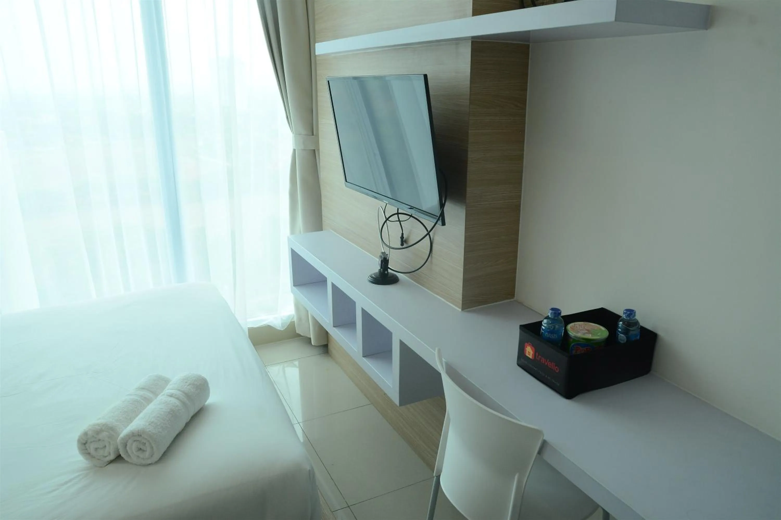 Bed in Brand New Studio Tree Park City BSD Apartment near ICE BSD By Travelio