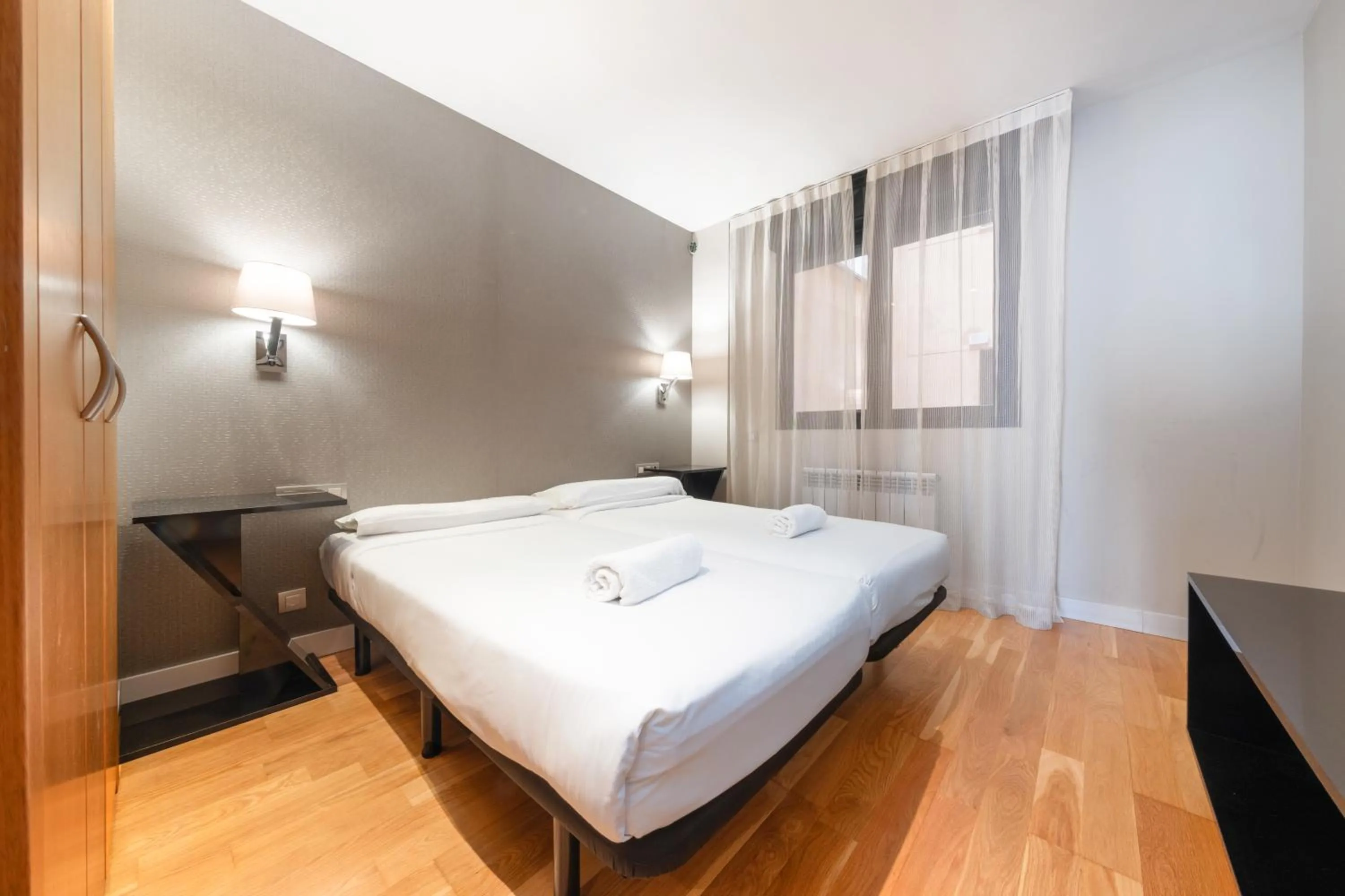 Bed in AinB Sagrada Familia Apartments