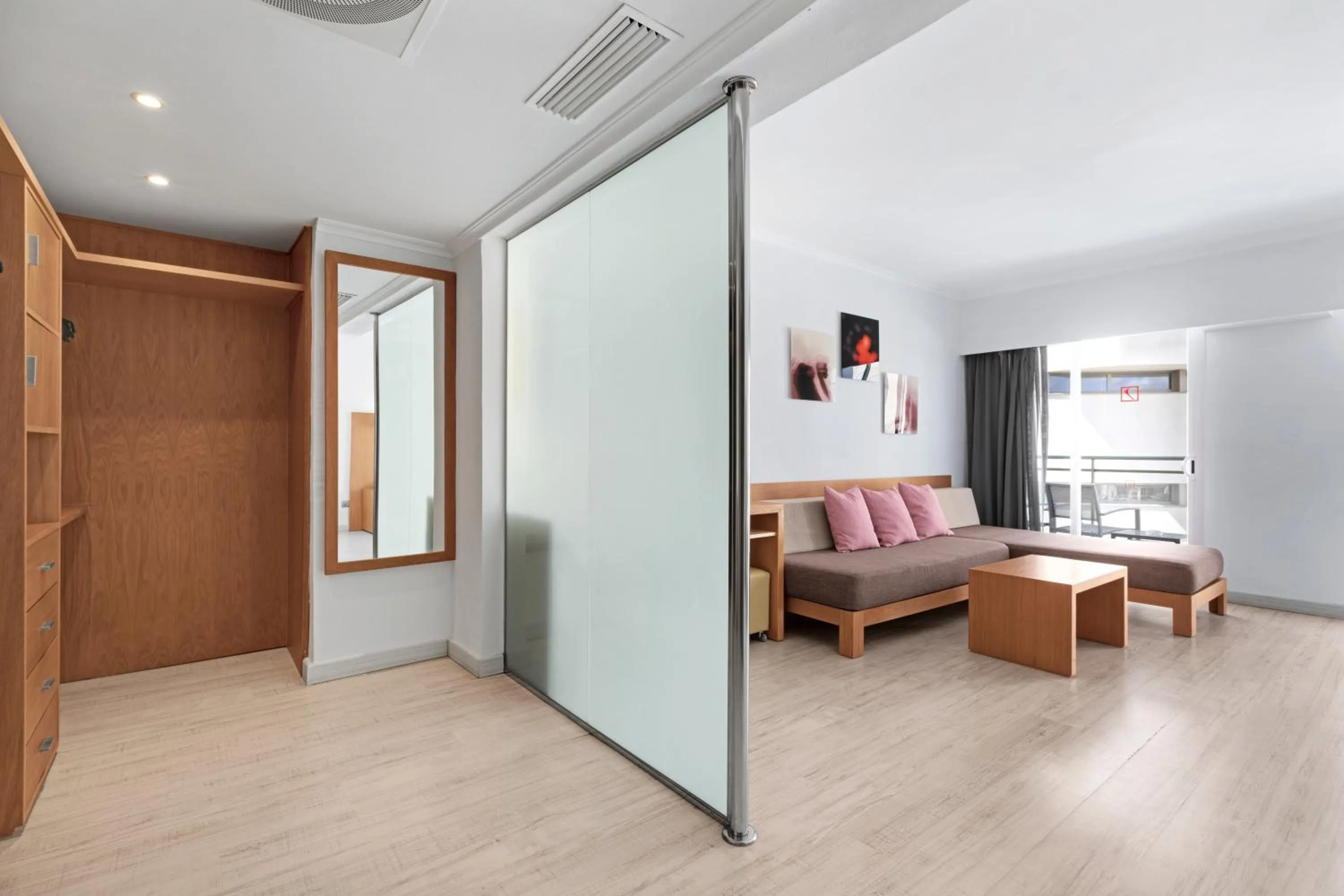 Living room, Bed in Hotel Timor