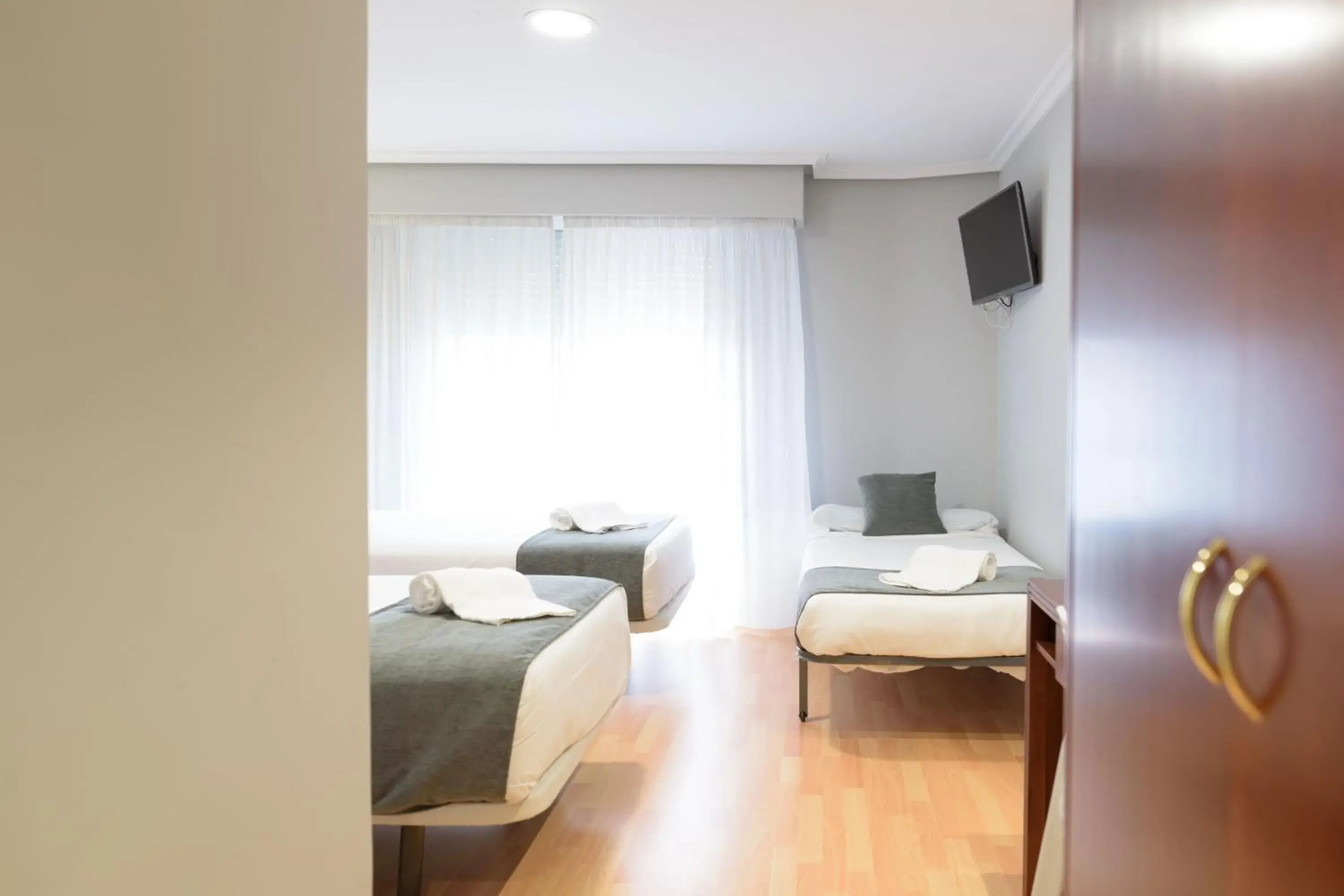 Triple Room in Hotel Alda Xinzo Triple Room in Hotel Alda Xinzo