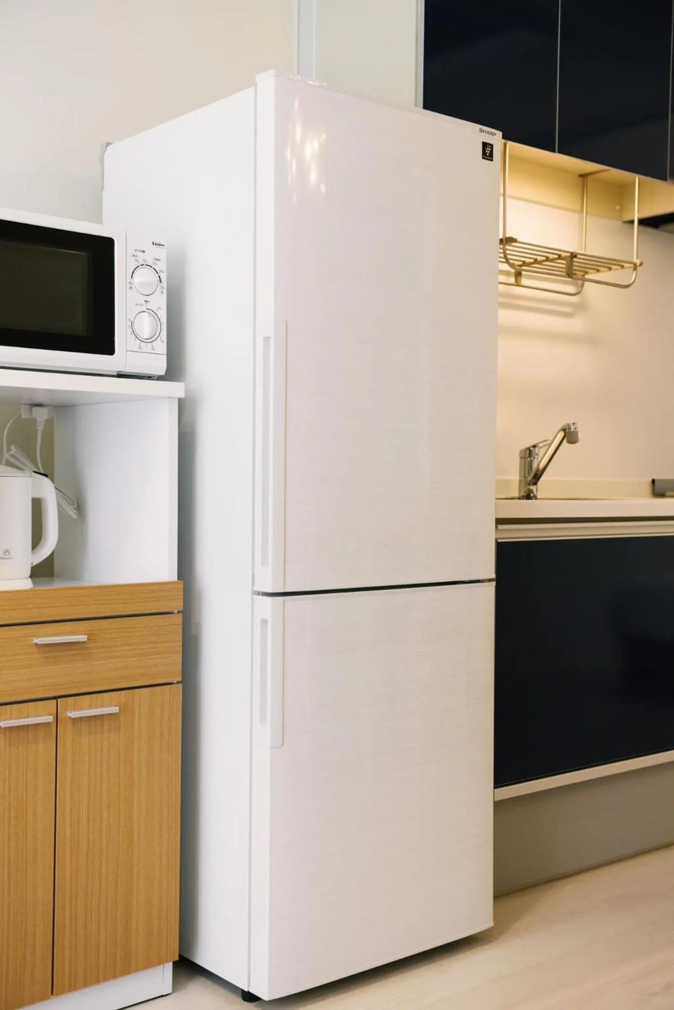 Kitchen or kitchenette in GRAND BASE Fukuoka