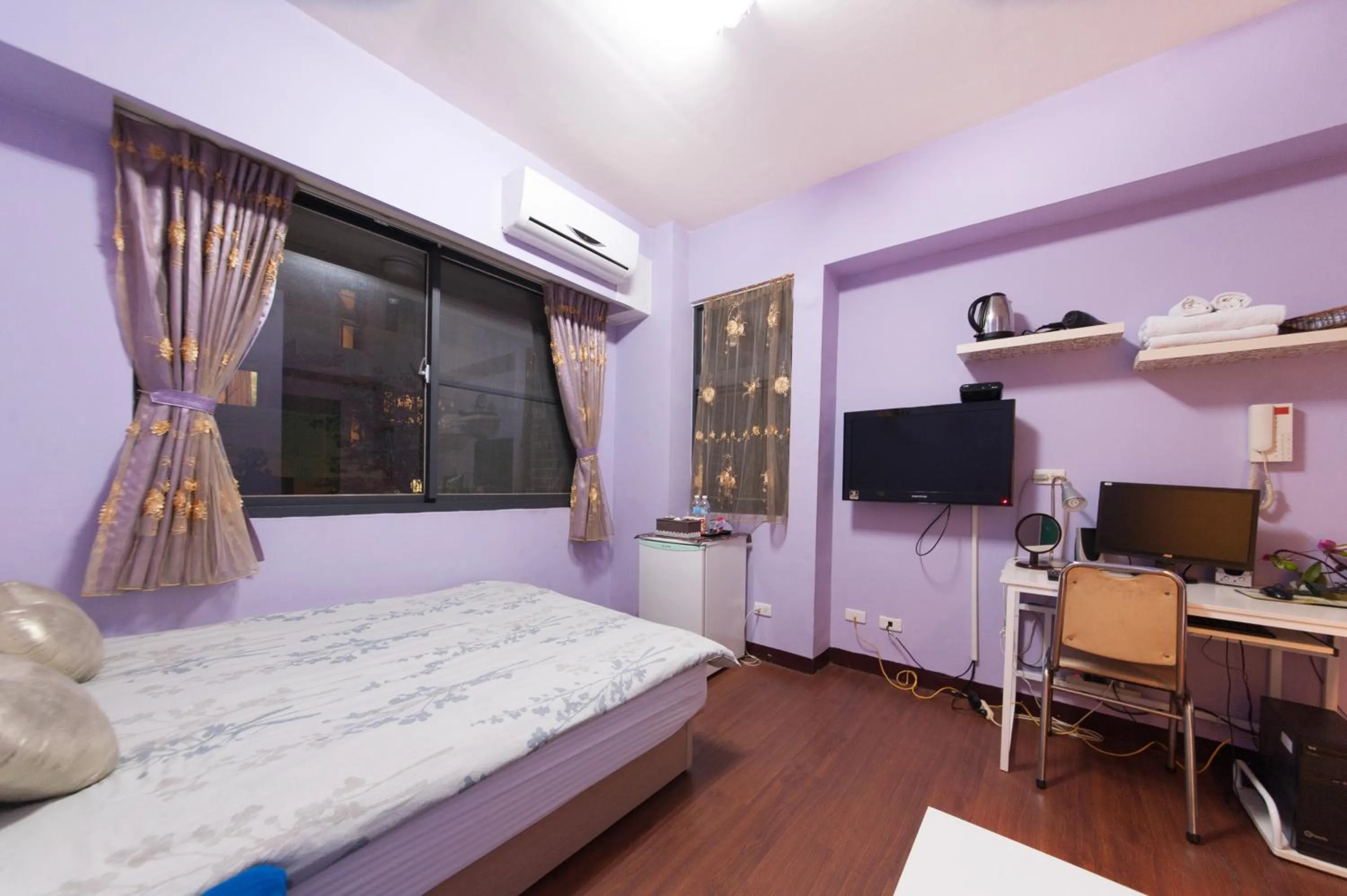 Bed in Feng Jia Homestay