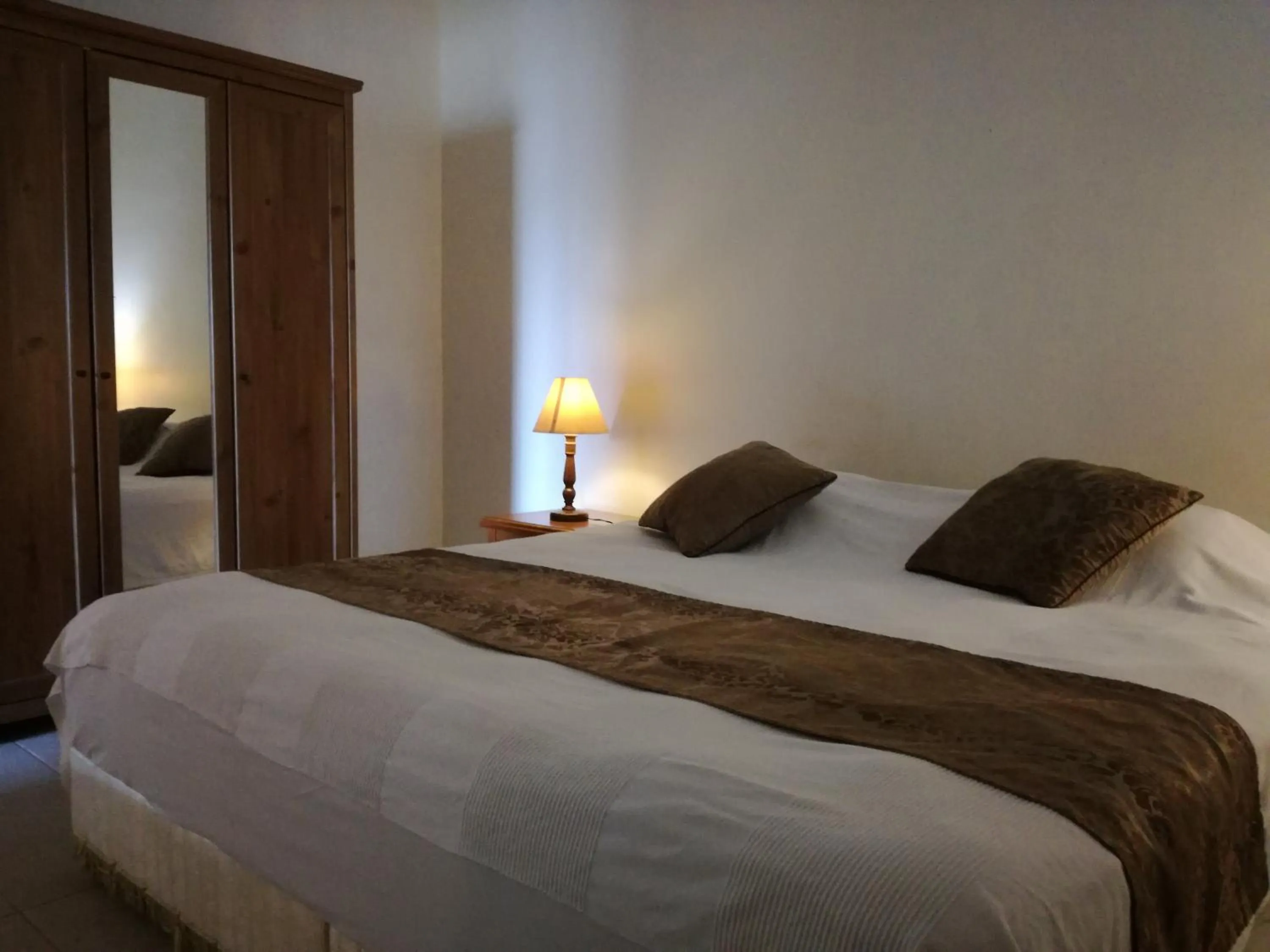 Bed in Trendzone Apartments