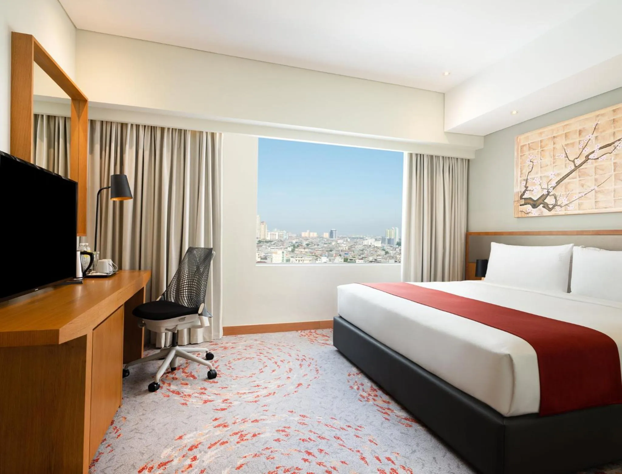 Photo of the whole room, Bed in Holiday Inn & Suites Jakarta Gajah Mada by IHG