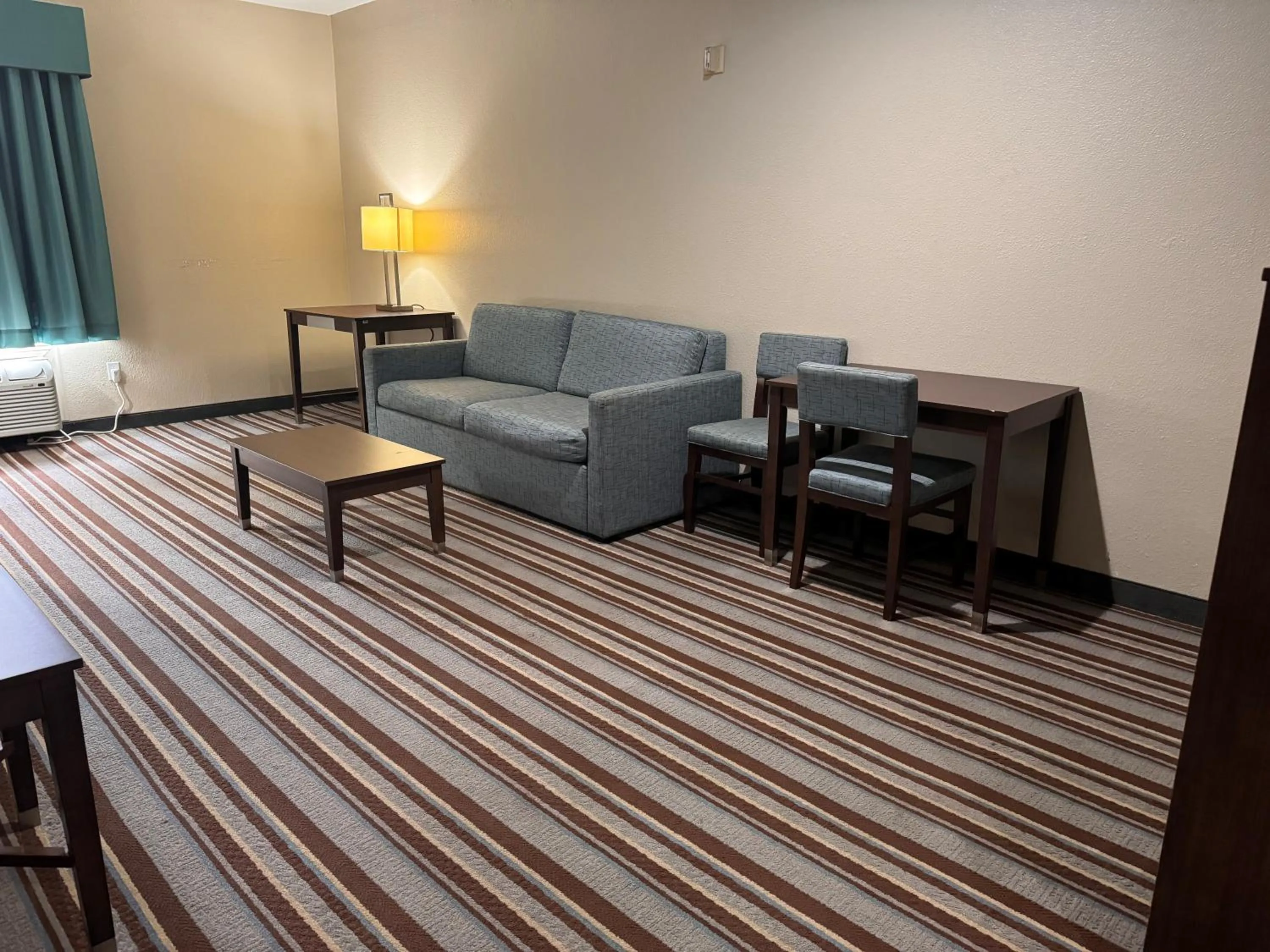 Living room in Super 8 by Wyndham Port Arthur/Nederland Area