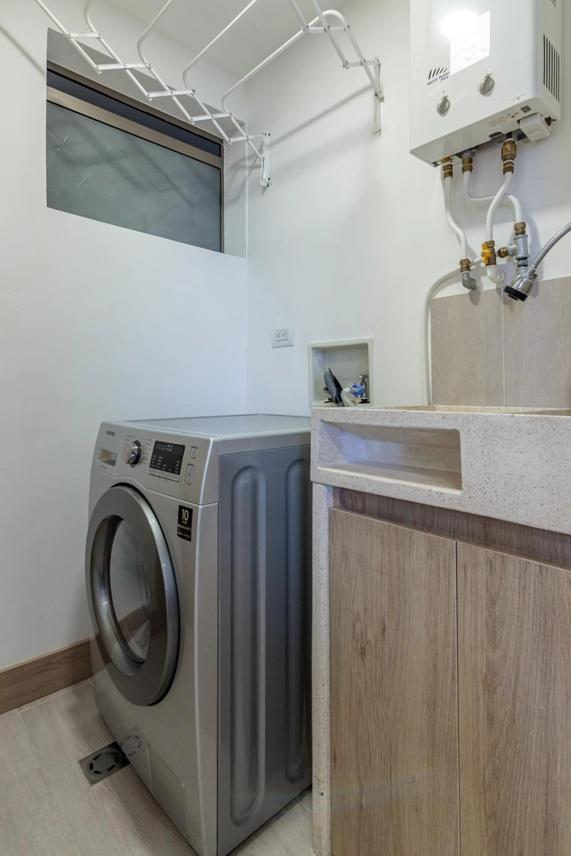 washing machine in Alcazar de Oviedo by EE Hoteles