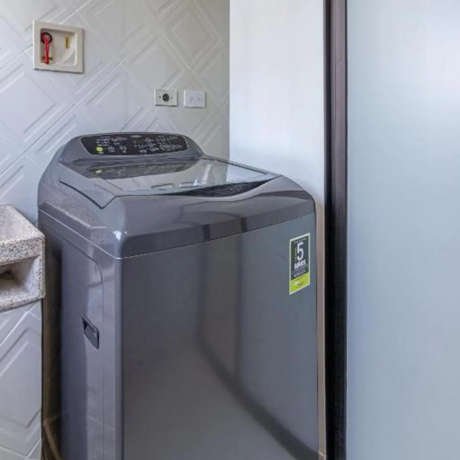 washing machine in Alcazar de Oviedo by EE Hoteles