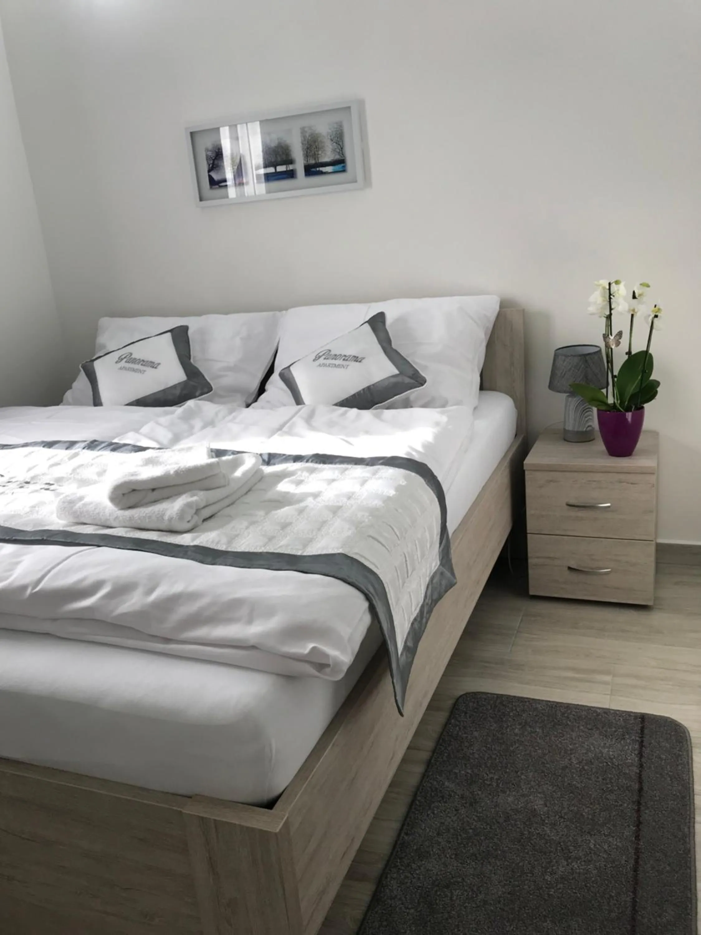 Bed in Panorama Apartments