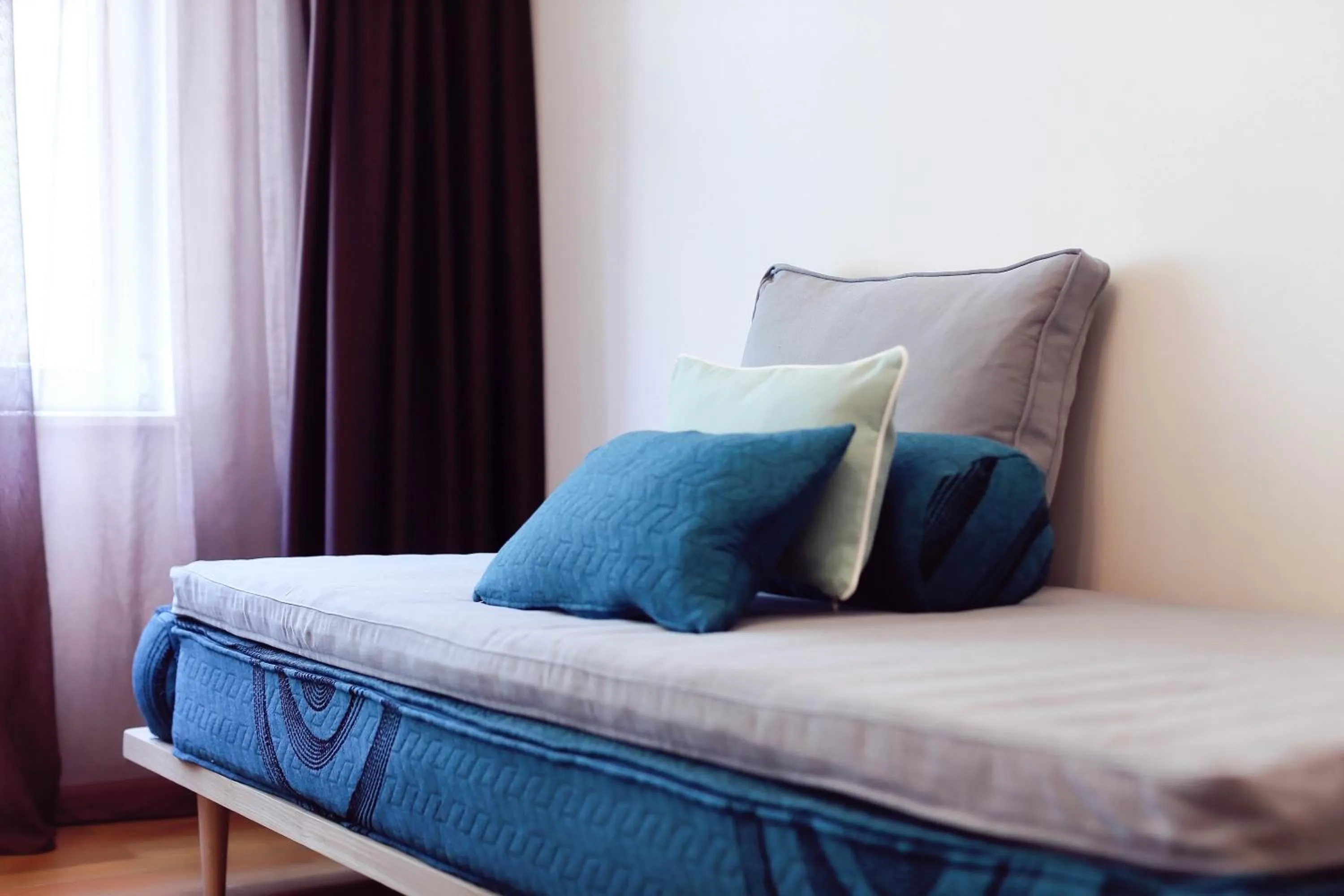 Bed in Living In Aparthotel